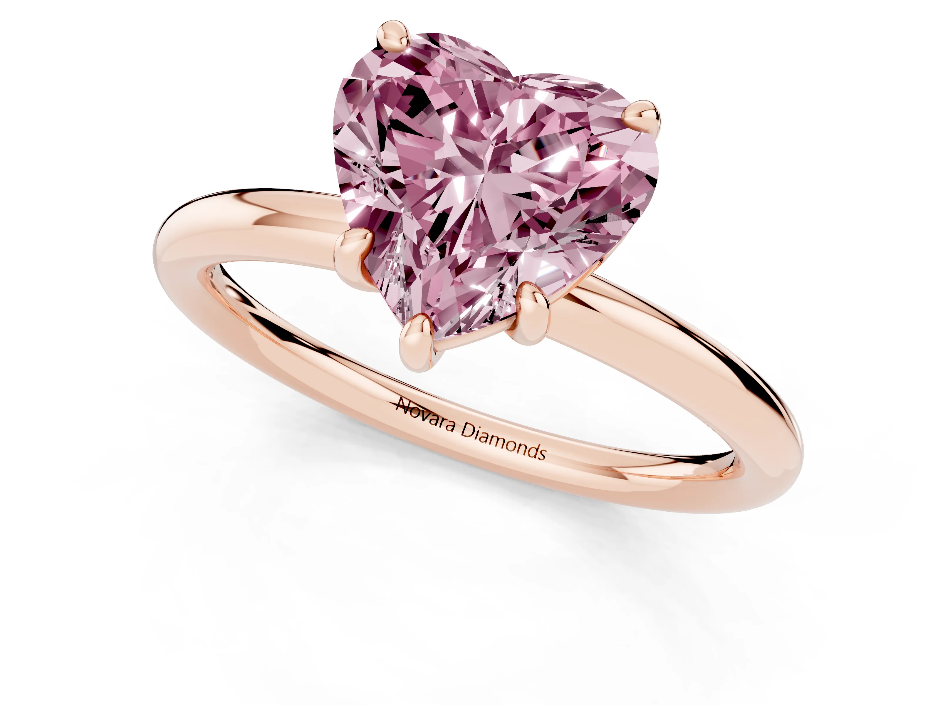 Fancy Pink Heart Cut Diamond Solitaire Ring Set in Rose gold with Prong Setting on a Polished Plain Band