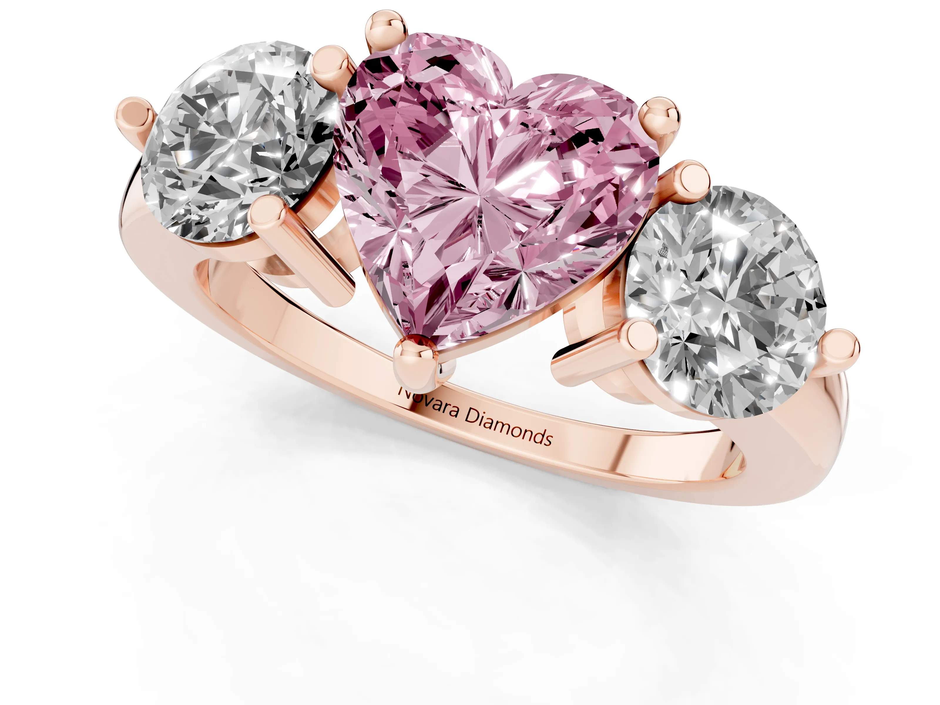 Fancy Pink Heart Cut Diamond Three-Stone Ring Set in Rose gold with Prong Setting and Classic Band
