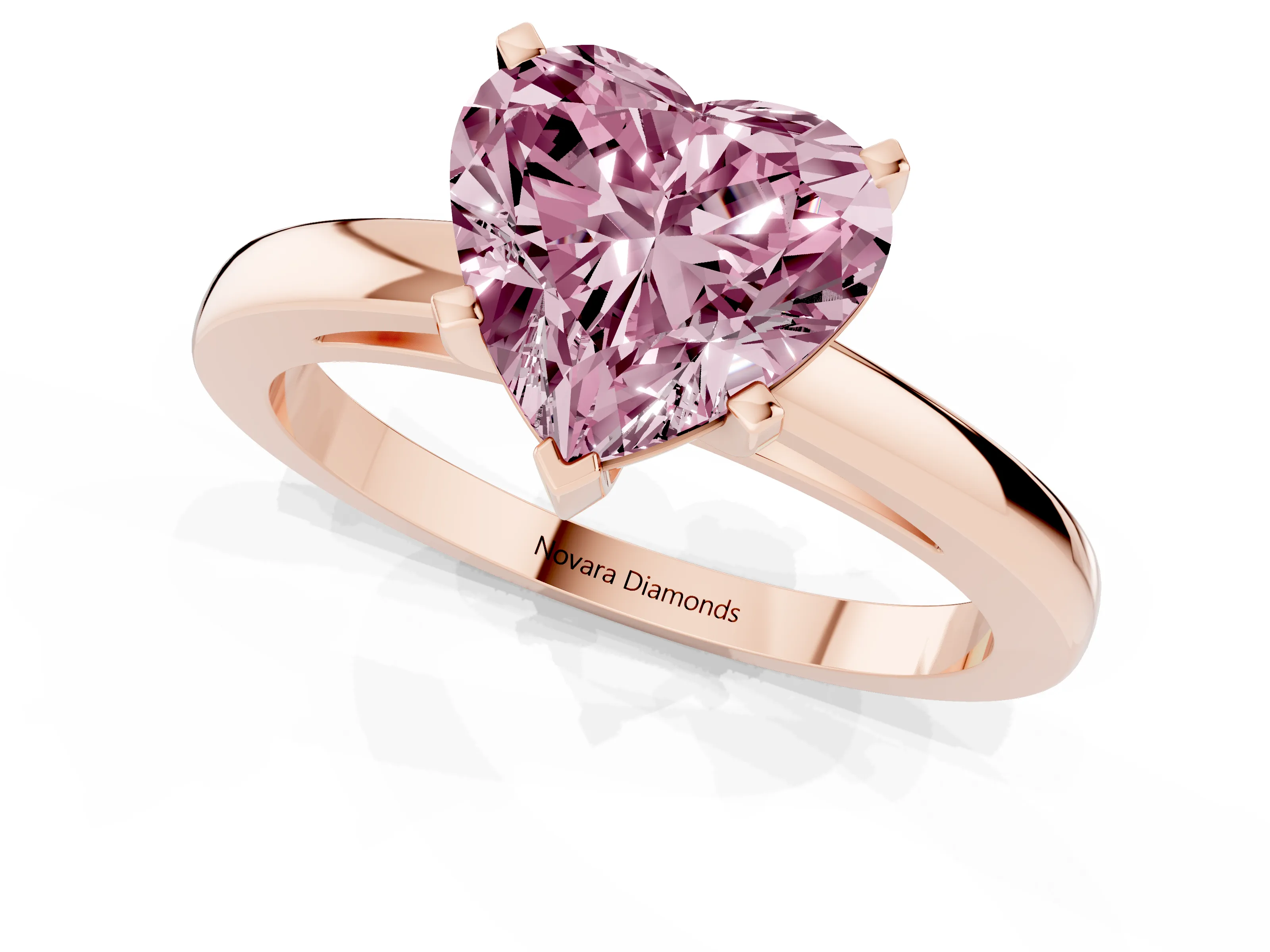 Fancy Pink Heart Cut Diamond Solitaire Engagement Ring Set in Rose gold with Prong Setting on a Classic Band