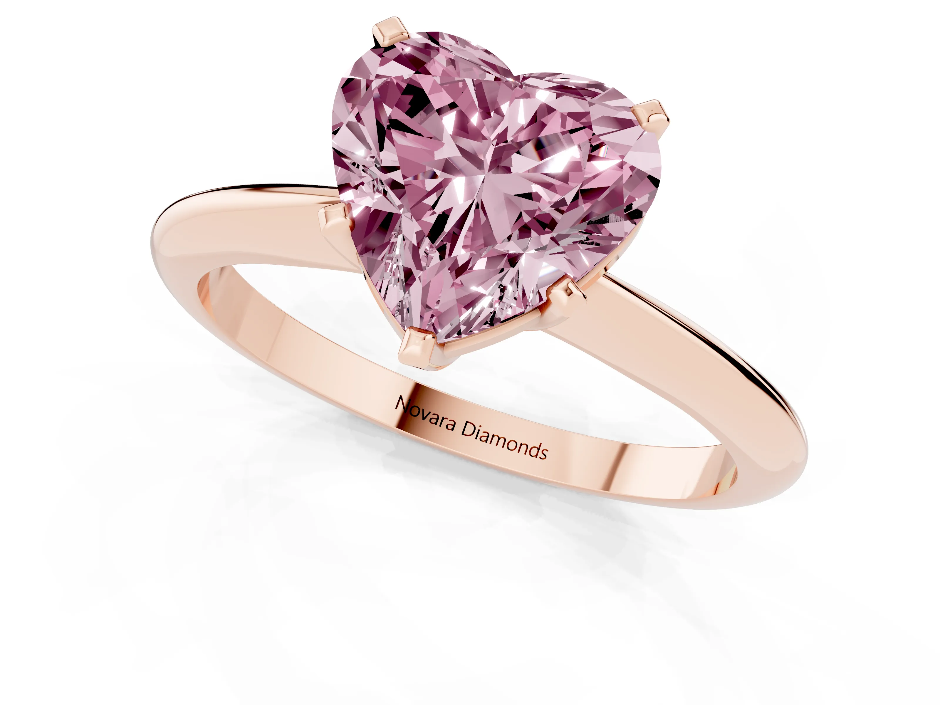Fancy Pink Heart Cut Diamond Solitaire Ring Set in Rose gold with Prong Setting on a Plain Round Band