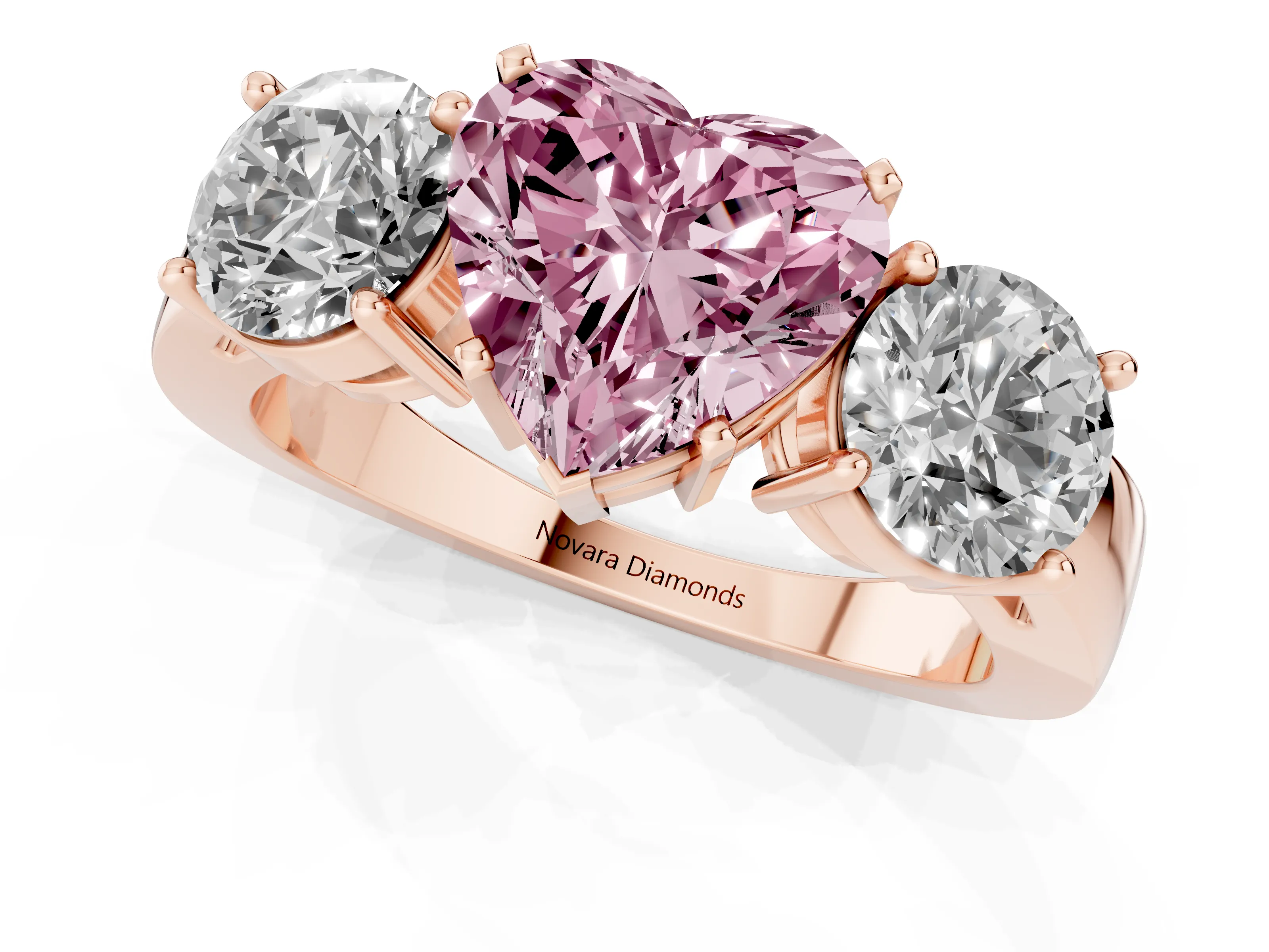 Fancy Pink Heart Cut Diamond Three-Stone Ring Set in Rose gold with Round Side Stones and Classic Band