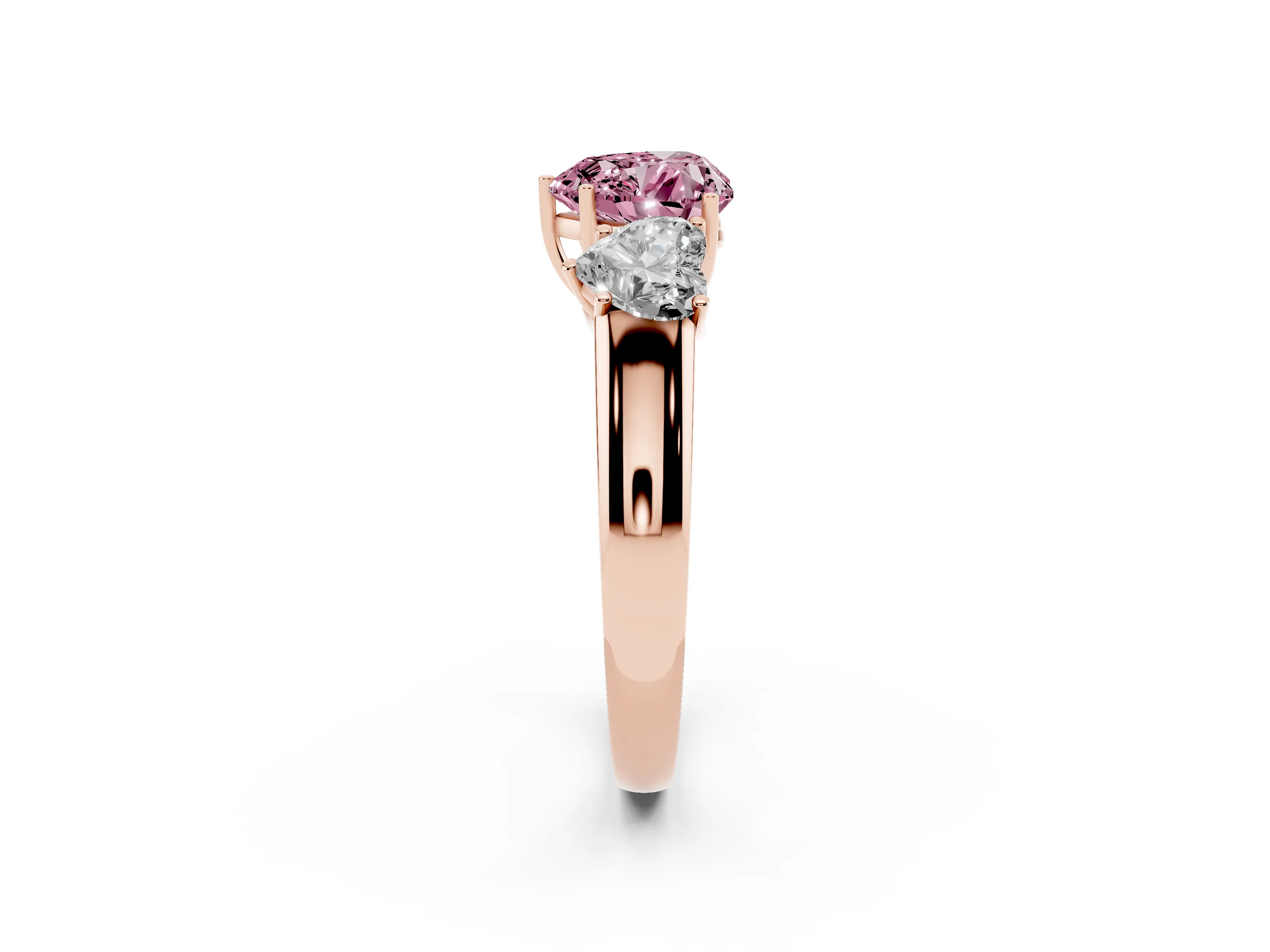 Fancy Pink Three-Stone Heart Cut Diamond Ring Set in Rose gold with Matching Prong Settings and Plain Band