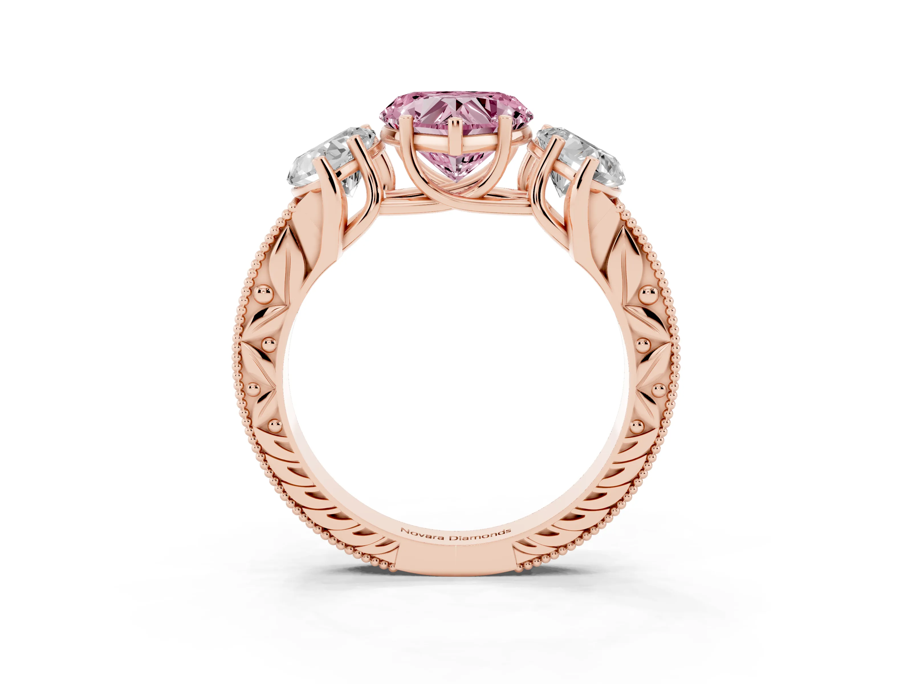 Fancy Pink Heart Cut Diamond Three-Stone Engagement Ring Set in Rose gold with Milgrain Pavé Band