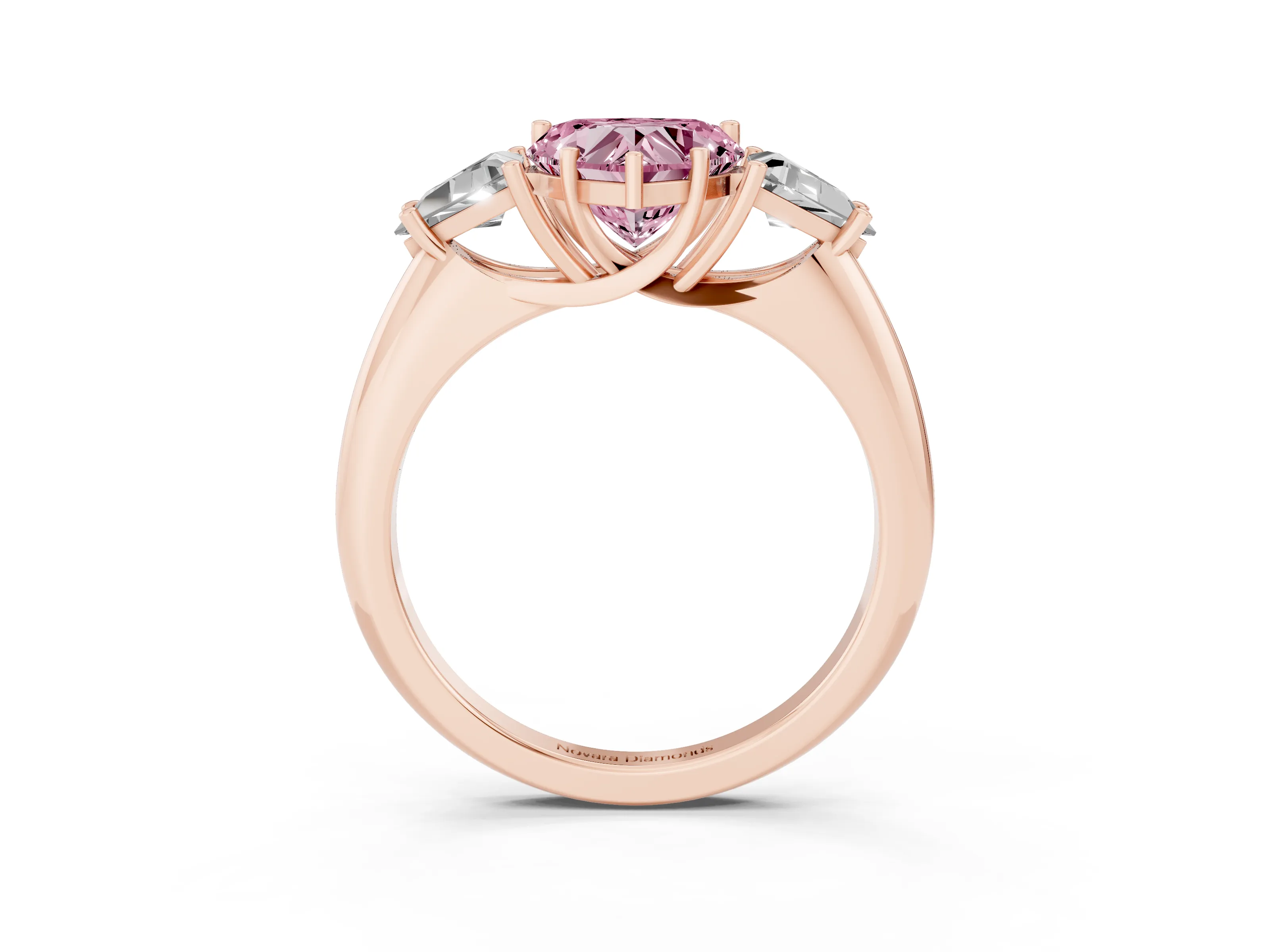 Fancy Pink Heart Cut Diamond Three-Stone Engagement Ring Set in Rose gold with Trillion Side Stones