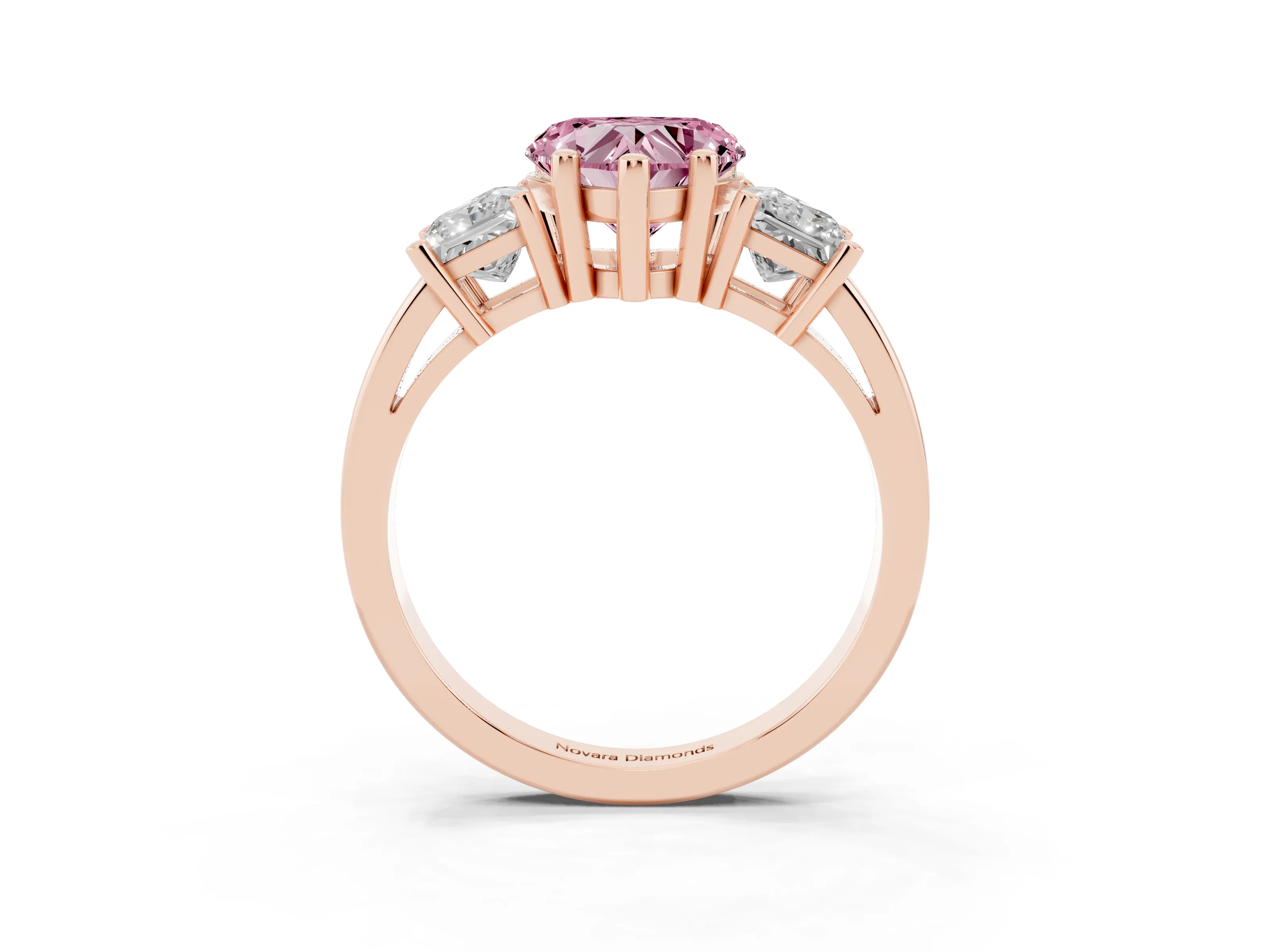 Fancy Pink Three-Stone Heart Cut Diamond Solitaire Ring Set in Rose gold with Prong Setting
