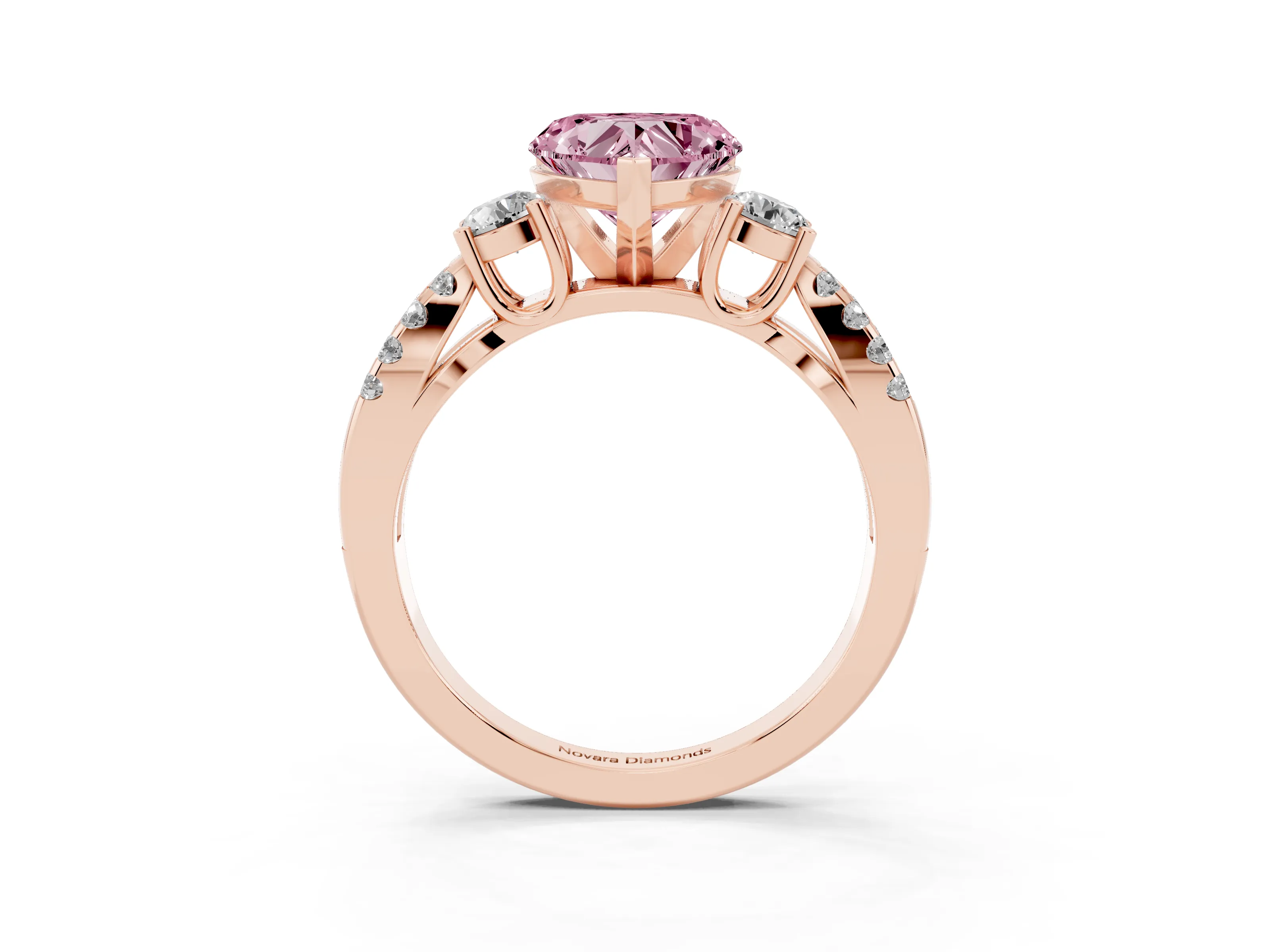 Fancy Pink Heart Cut Diamond Three-Stone Ring Set in Rose gold with Pavé Split Shank and Prong Setting