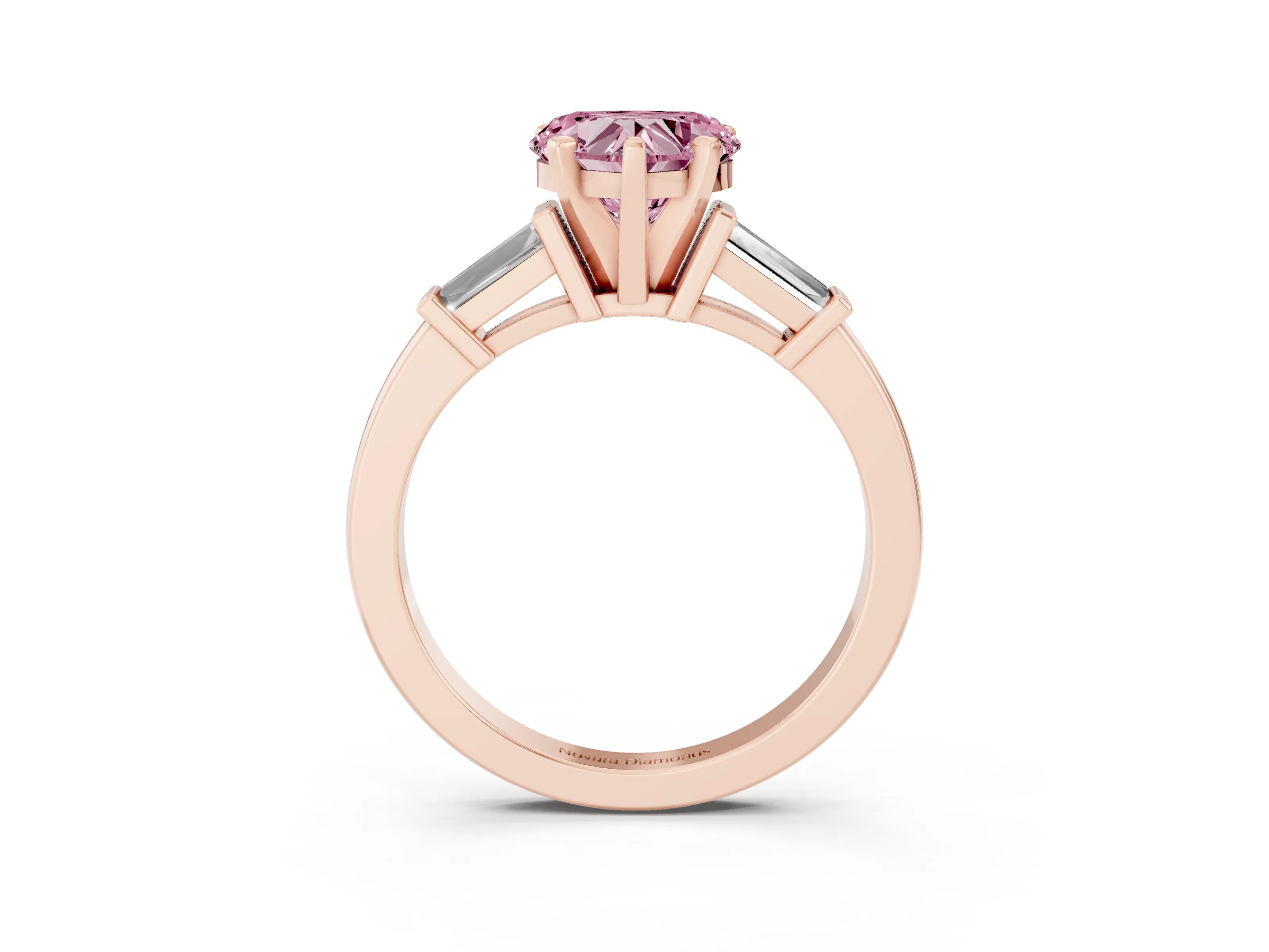 Fancy Pink Heart Cut Diamond Solitaire Ring Set in Rose gold with Tapered Baguette Accents and Prong Setting