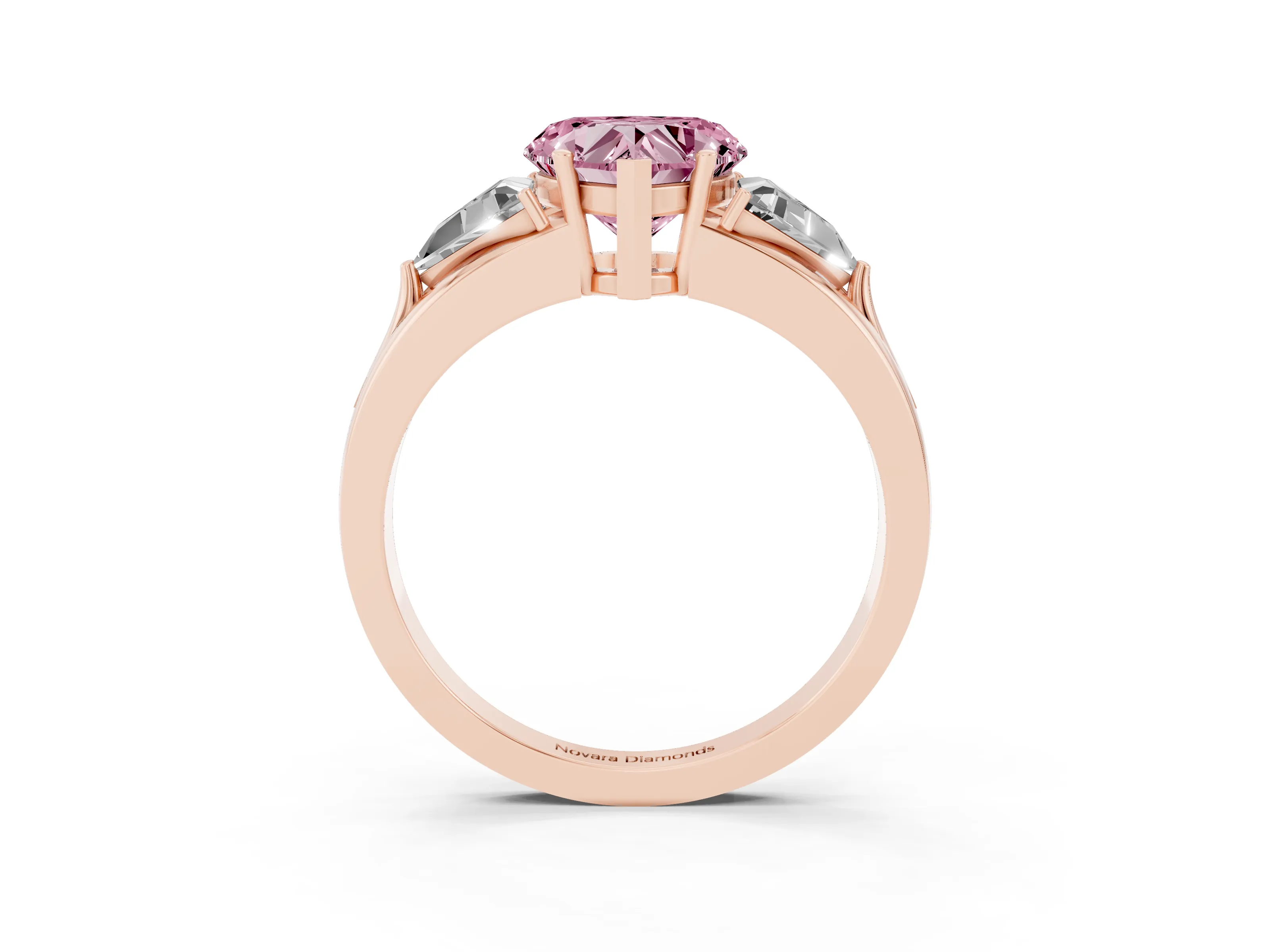 Fancy Pink Heart Cut Diamond Three-Stone Ring Set in Rose gold with Trillion Side Stones and Split Shank