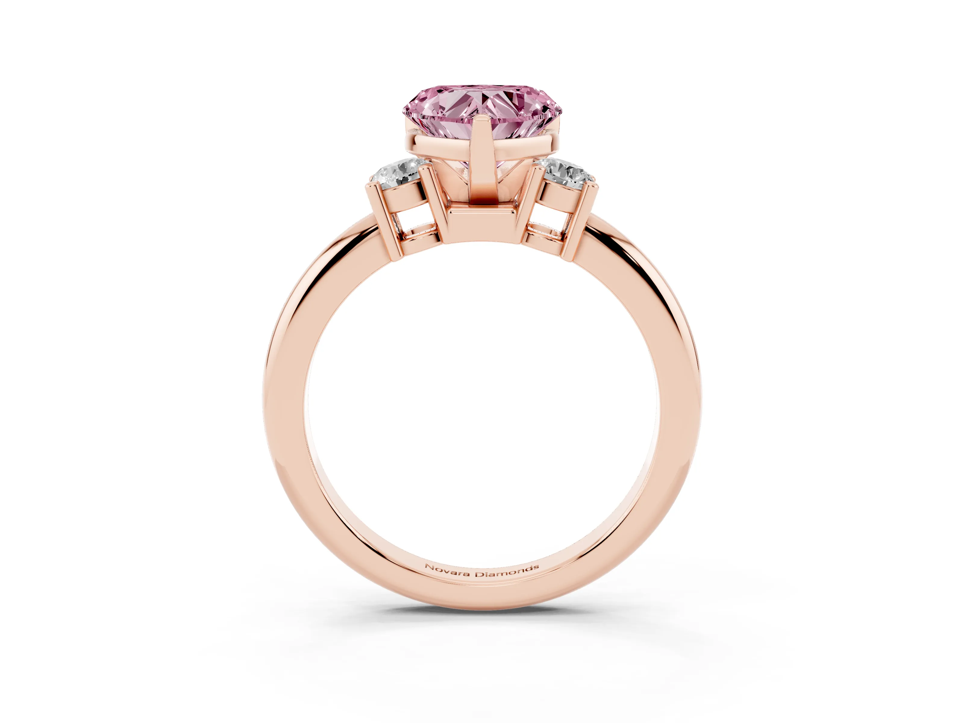 Fancy Pink Three-Stone Heart Cut Diamond Ring Set in Rose gold with Prong Setting and Plain Band