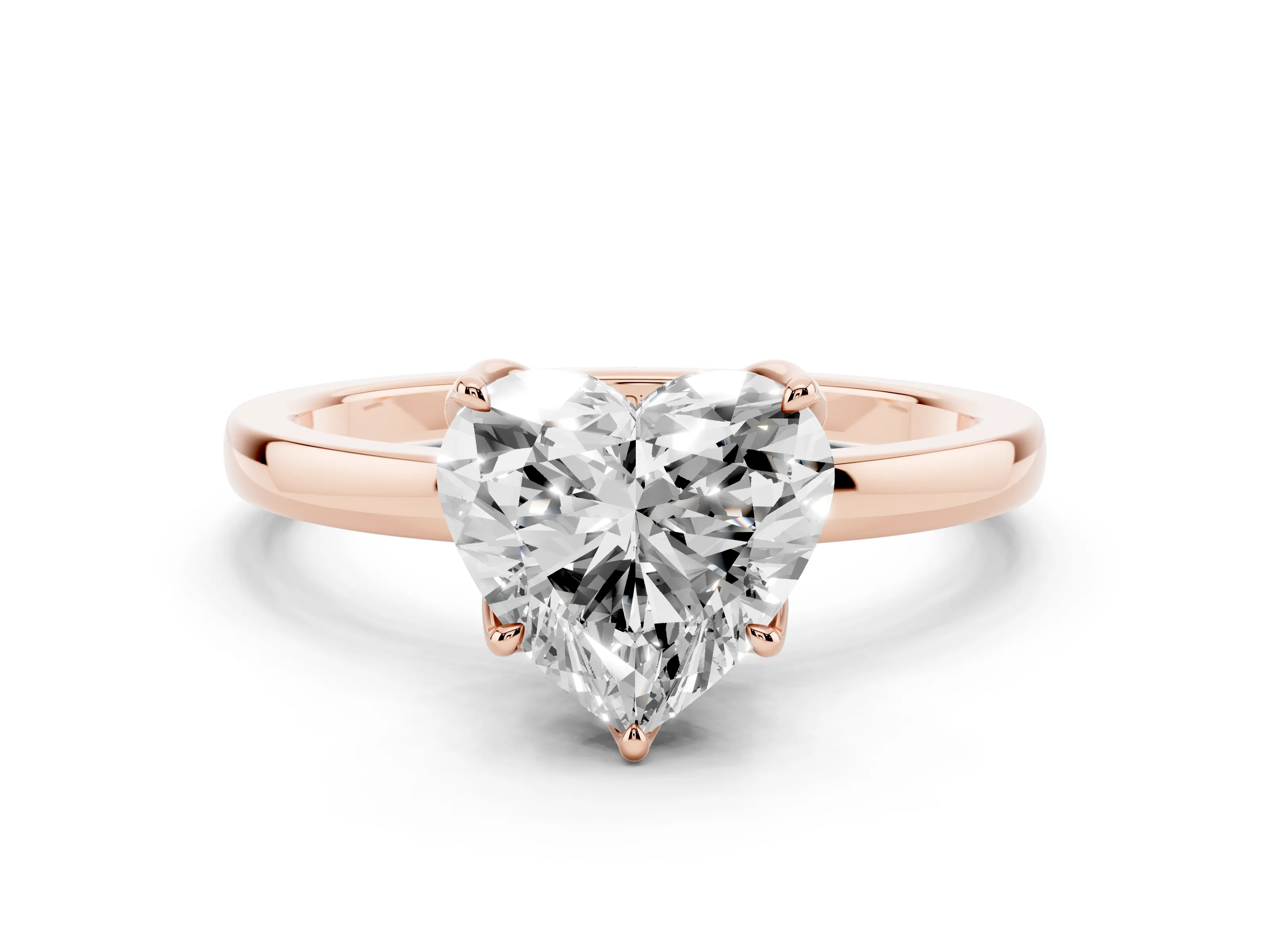 Heart Cut Diamond Solitaire Ring Set in Rose gold with Prong Setting and Thin Polished Band