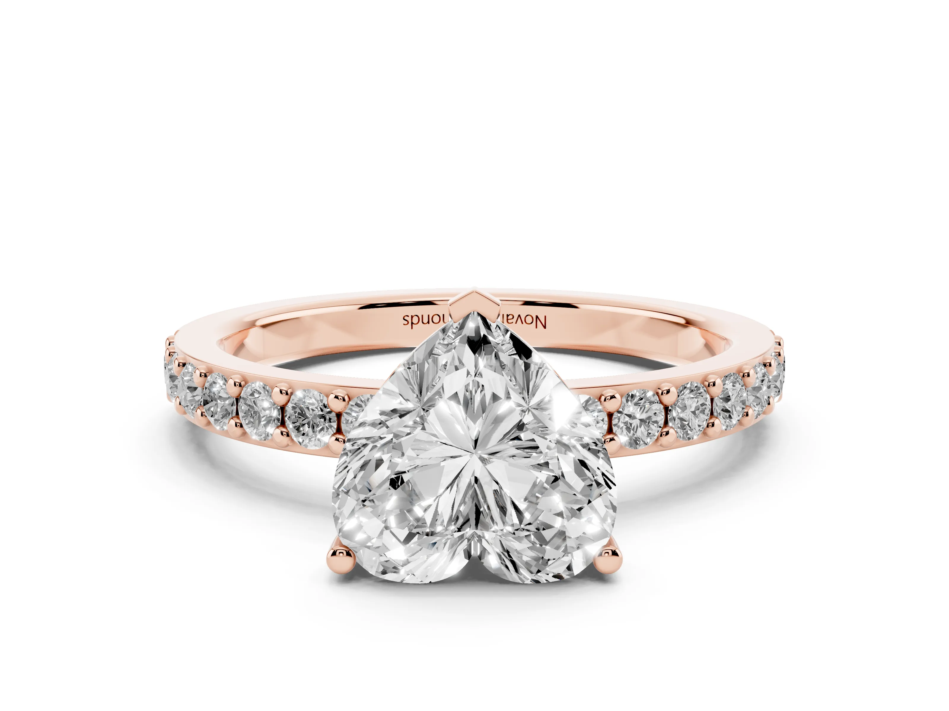 Heart Cut Diamond Solitaire Set in Rose gold with Round Pavé Band and Prong Setting