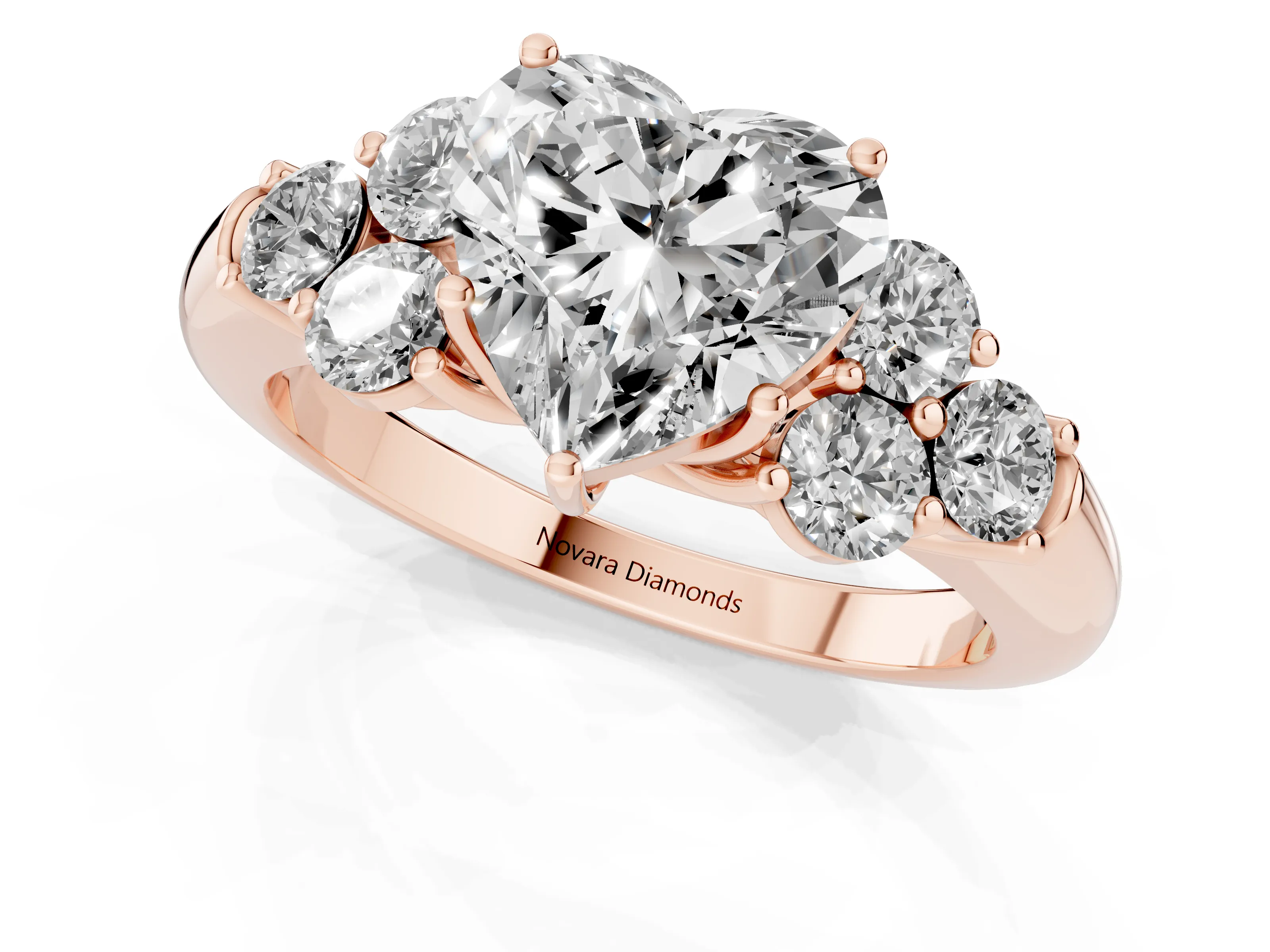 Heart Cut Diamond Cluster Ring Set in Rose gold with Round Accent Stones and Prong Setting on a Plain Band