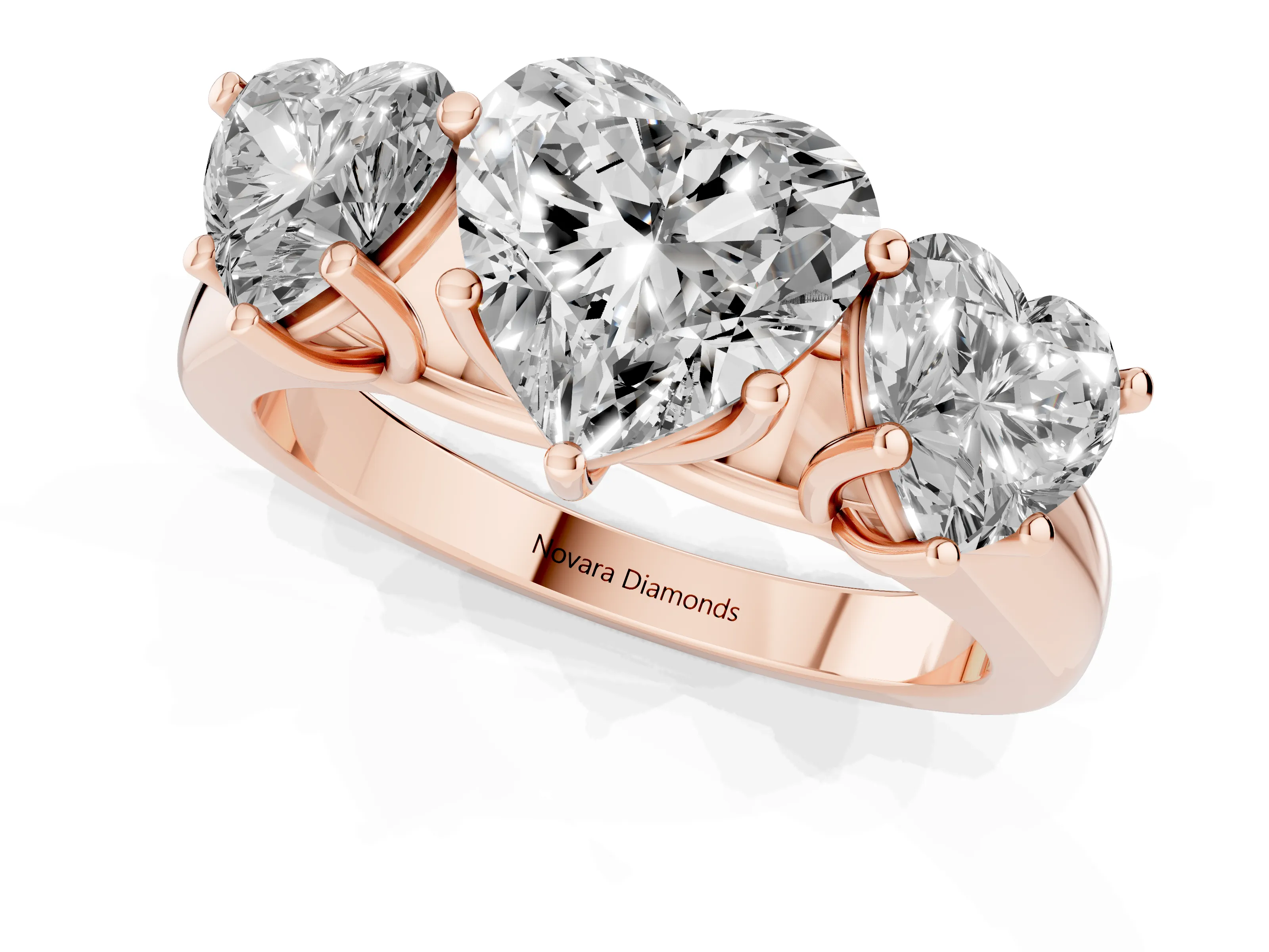 Heart Cut Diamond Three-Stone Ring Set in Rose gold with Plain Polished Band