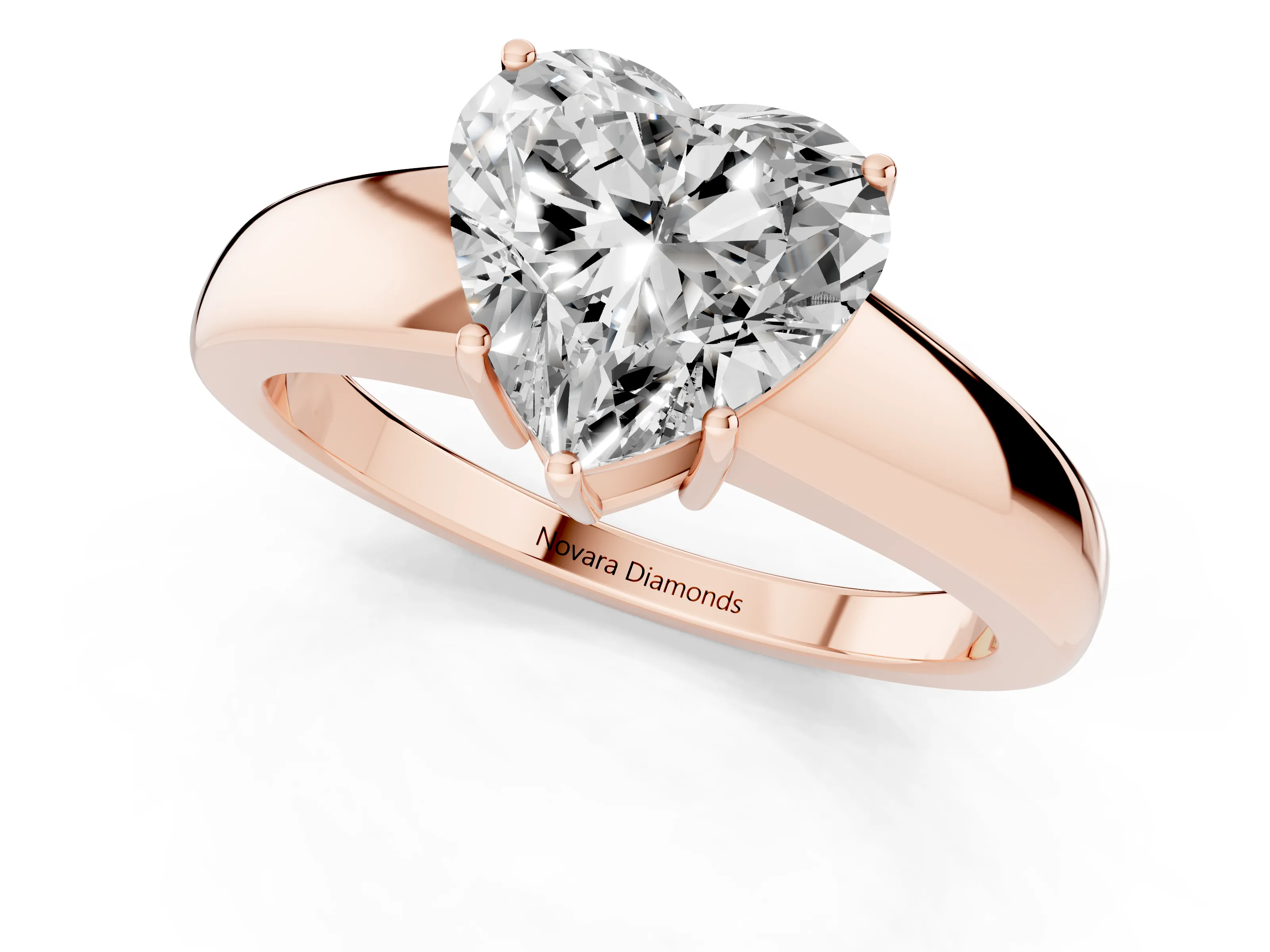 Heart Cut Diamond Solitaire Ring Set in Rose gold with Tapered Band and Prong Setting