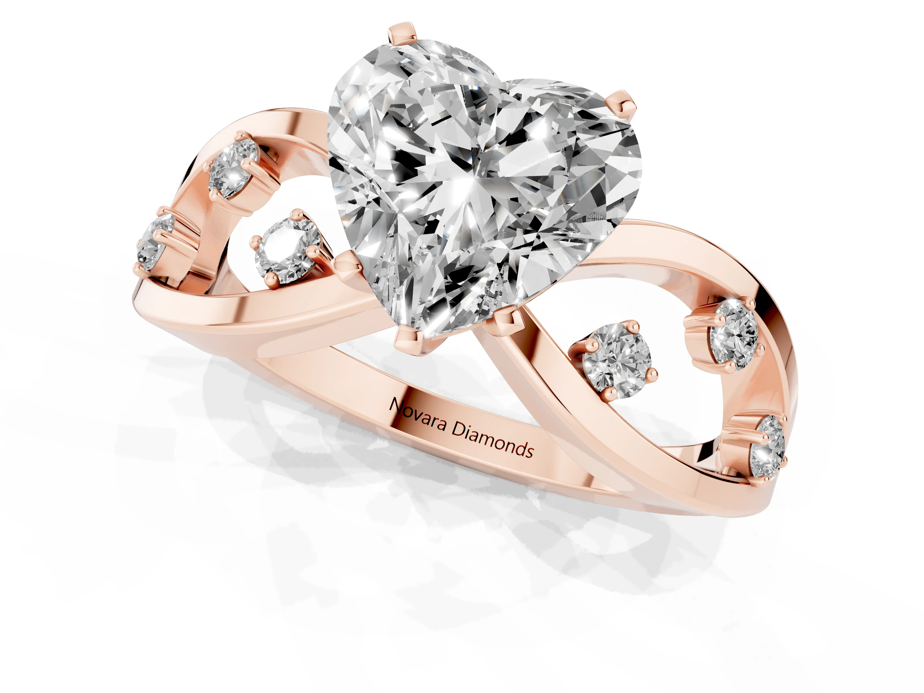 Heart Cut Diamond Solitaire Ring Set in Rose gold with Side Stones on Criss-Cross Band and Prong Setting