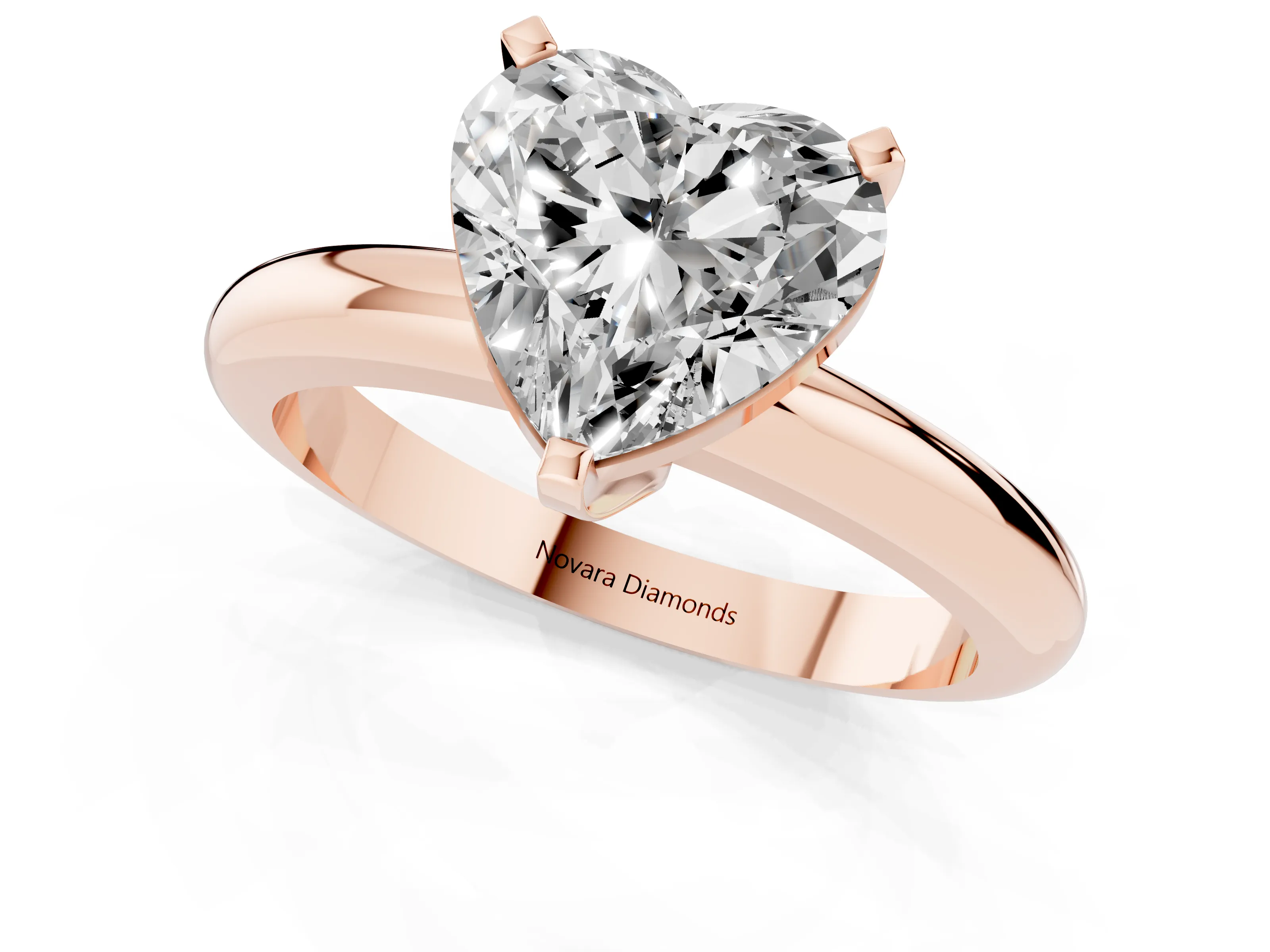 Heart Cut Diamond Solitaire Engagement Ring Set in Rose gold with Round Band and Prong Setting