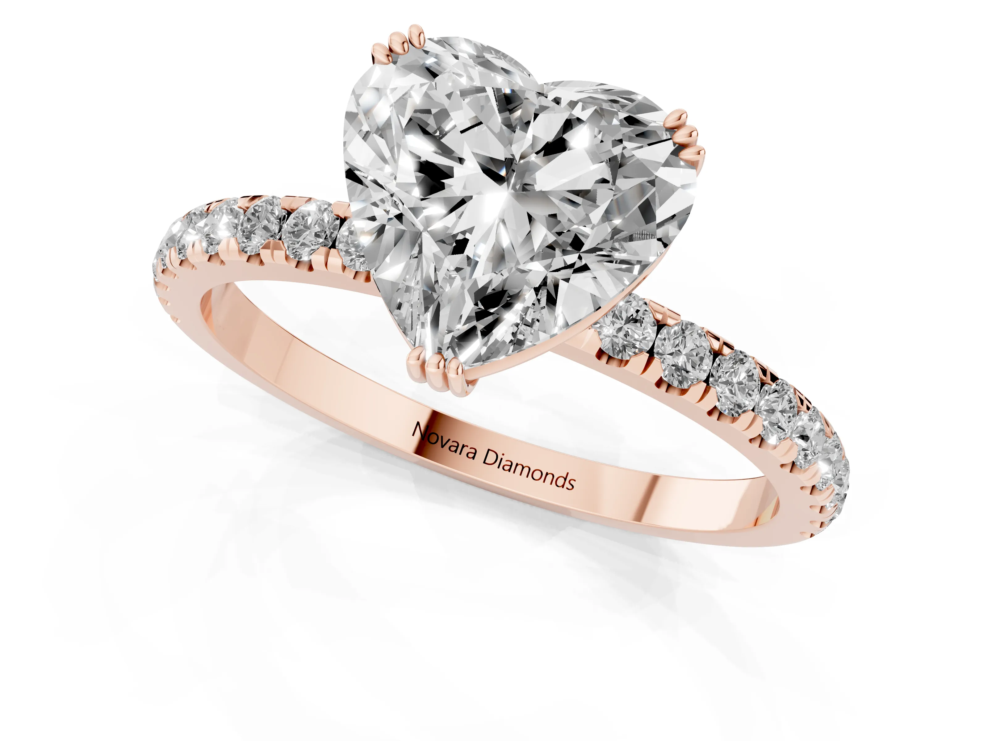 Heart Cut Diamond Brilliant Solitaire Set in Rose gold with Pavé Band and Claw Prong Setting