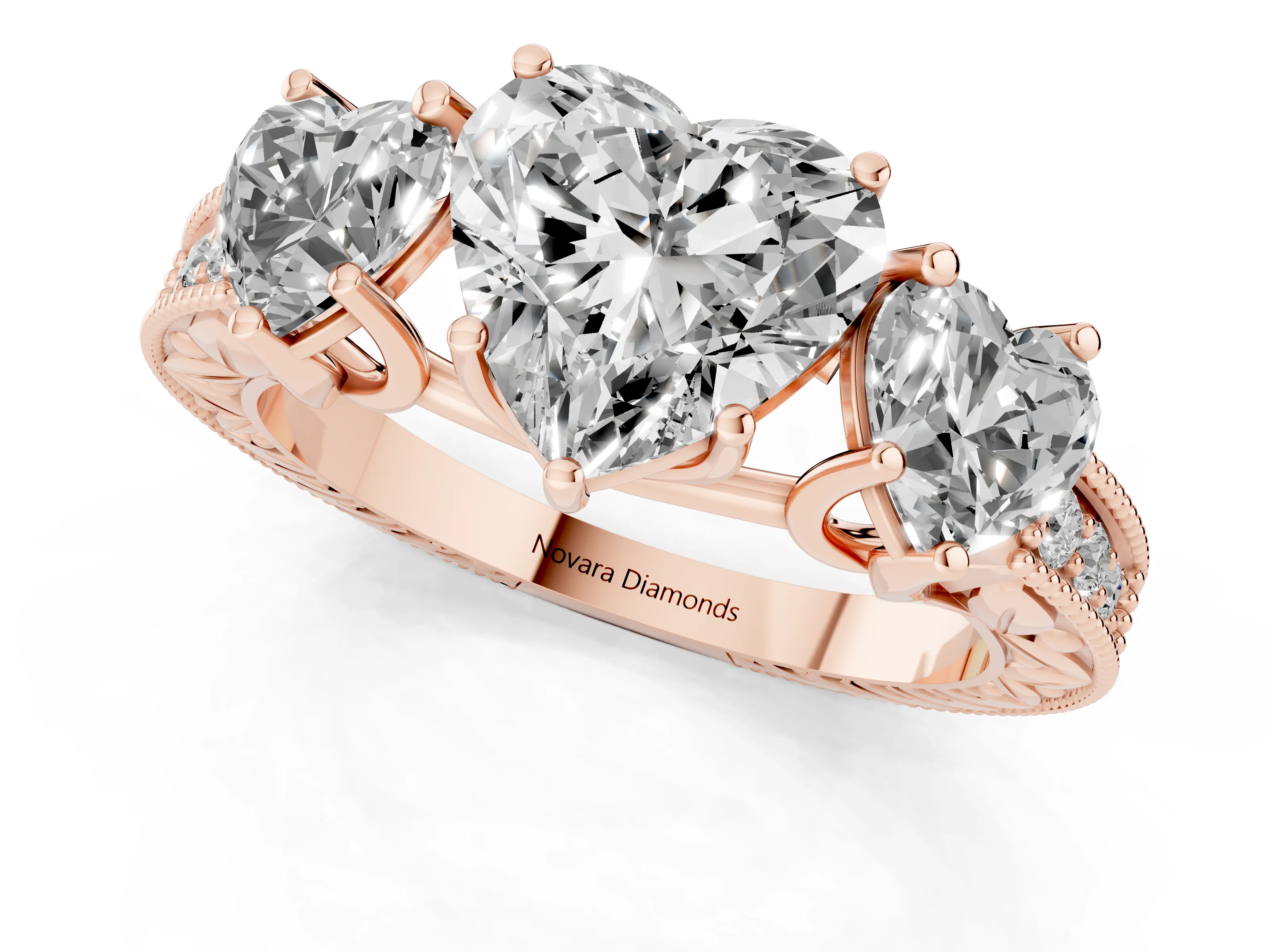 Heart Cut Diamond Three-Stone Engagement Ring Set in Rose gold with Milgrain Pavé Band