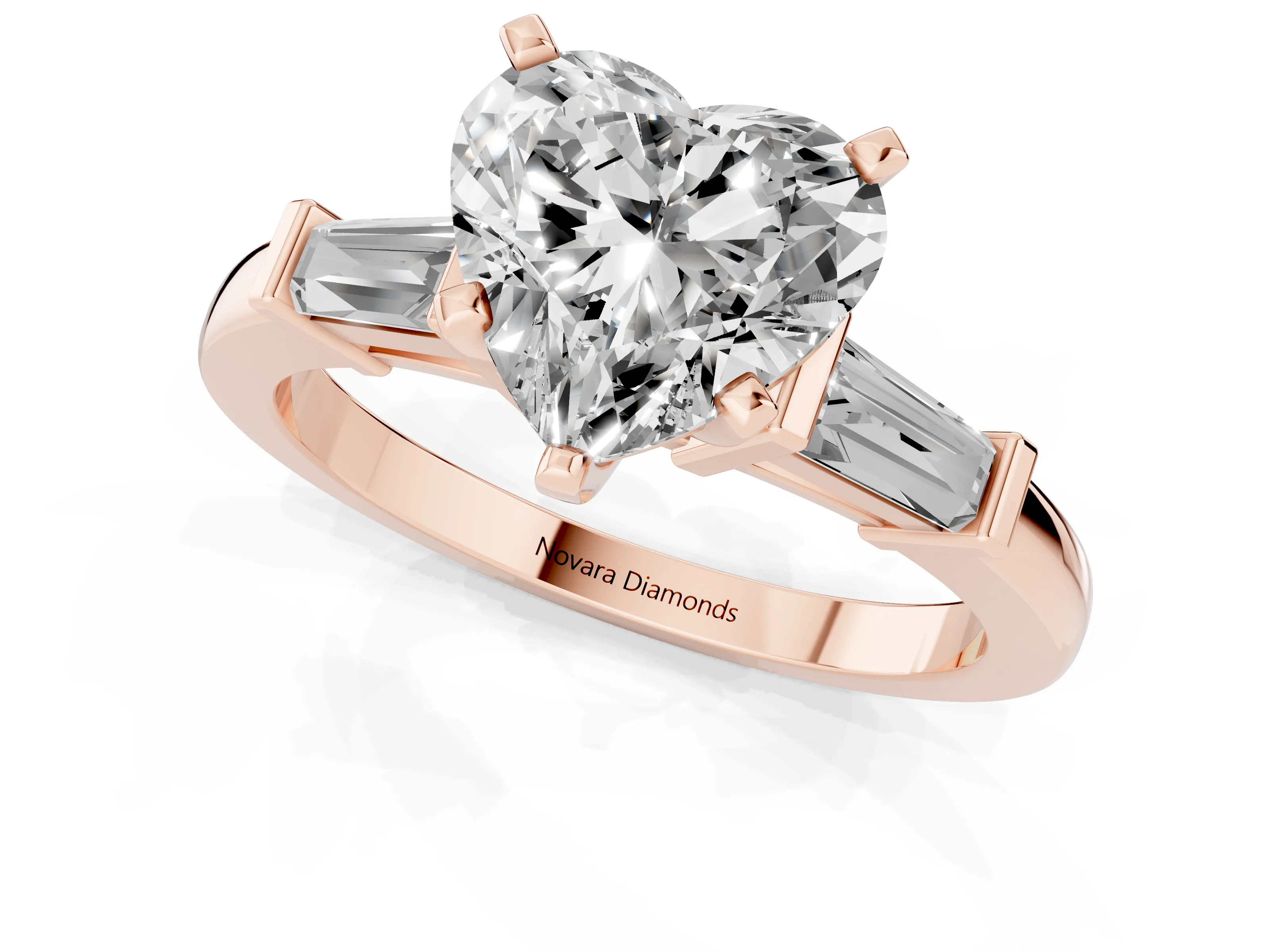 Heart Cut Diamond Solitaire Ring Set in Rose gold with Tapered Baguette Accents and Prong Setting