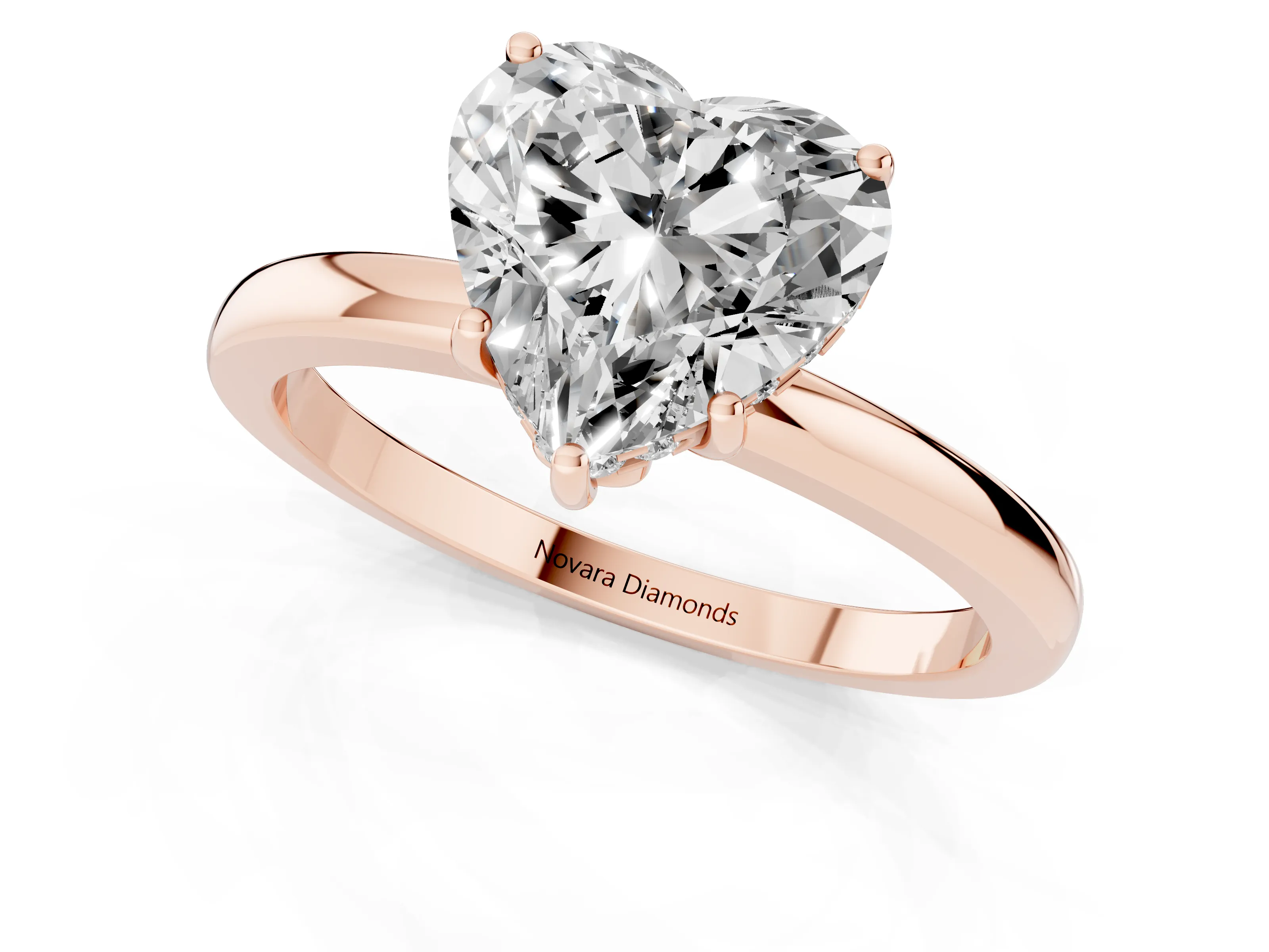 Heart Cut Diamond Solitaire Ring Set in Rose gold with Plain Band and Prong Setting