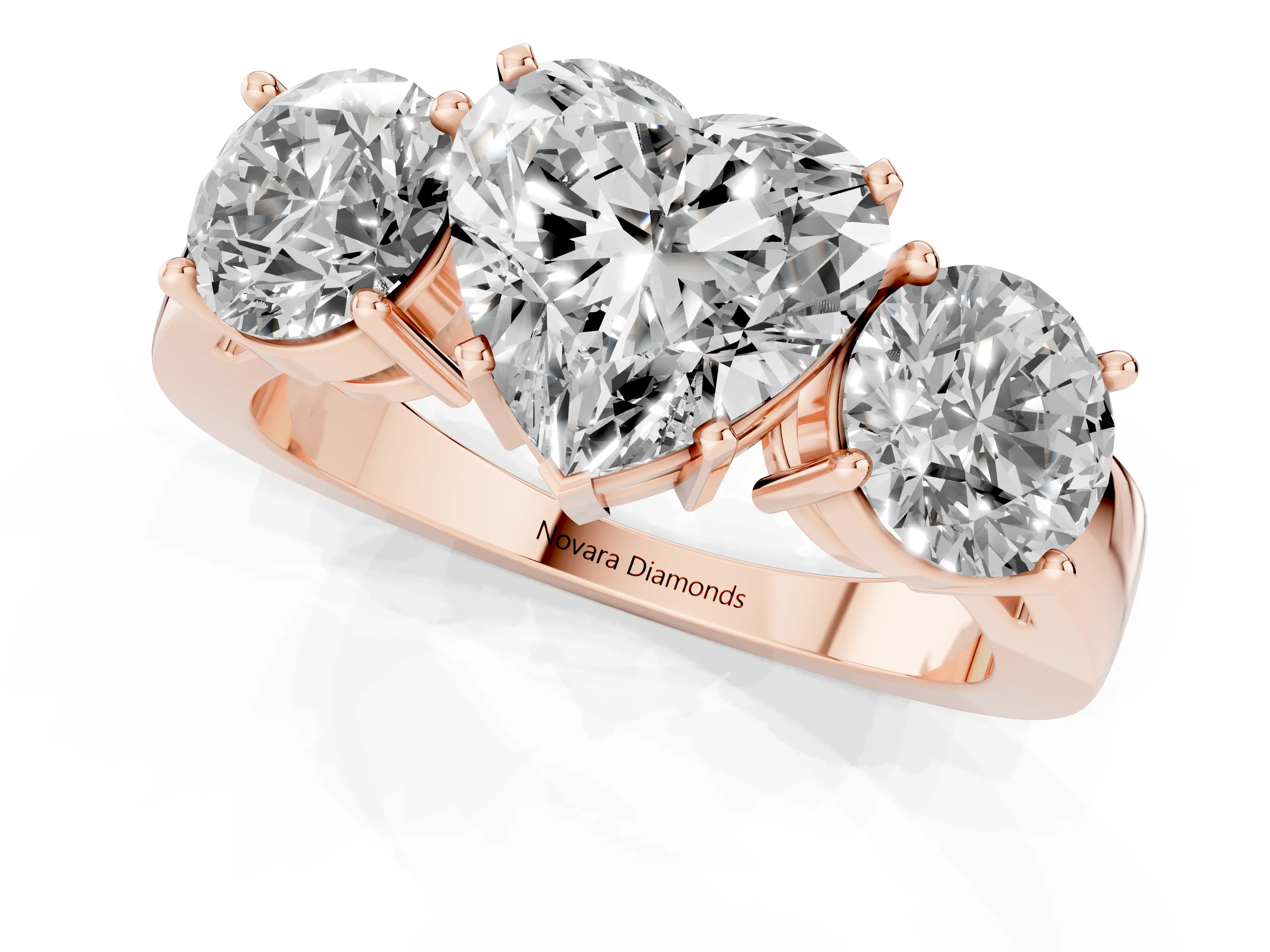 Heart Cut Diamond Three-Stone Ring Set in Rose gold with Round Side Stones and Classic Band