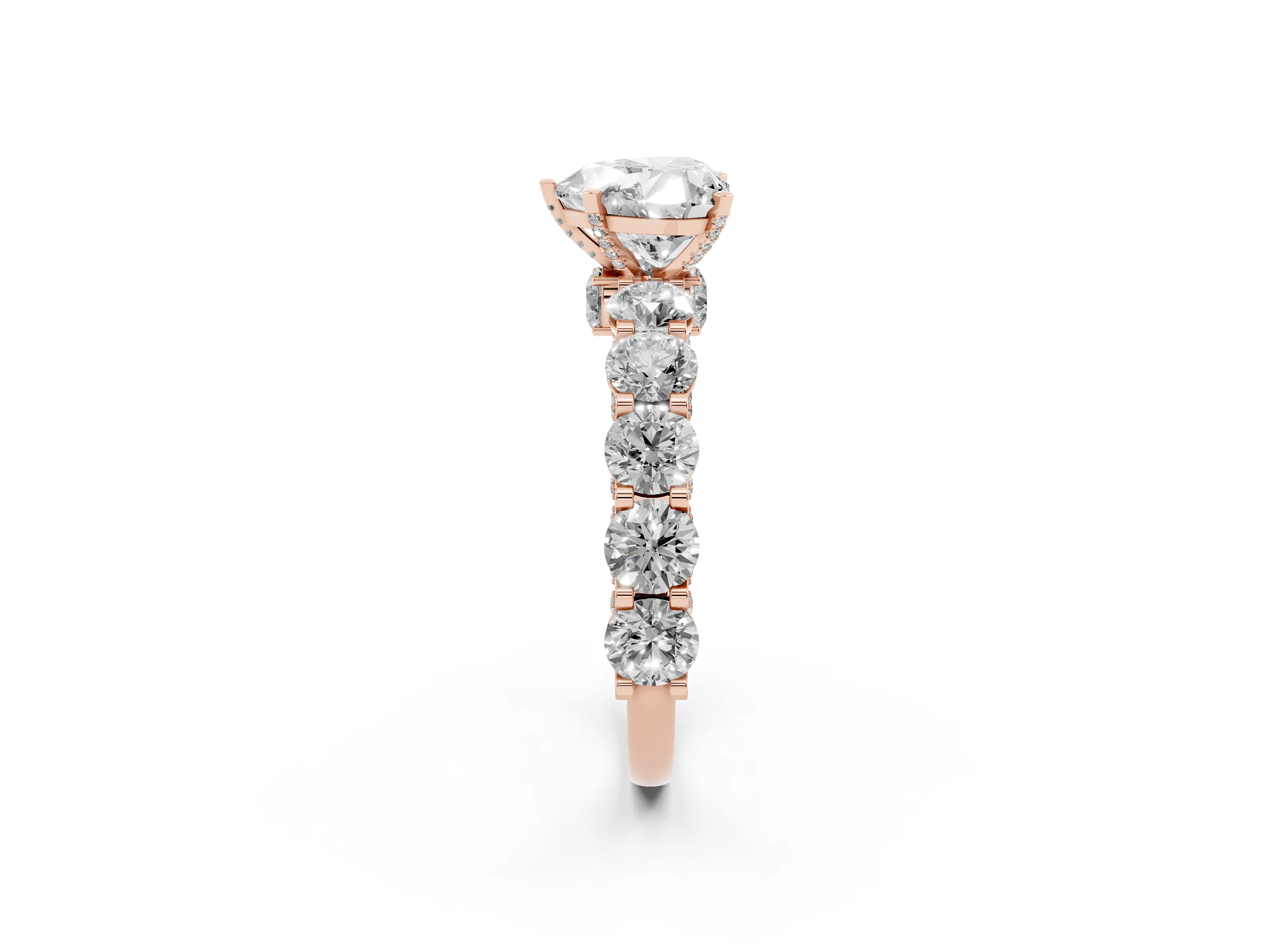 Heart Cut Diamond Side Stone Ring Set in Rose gold with Alternating Round and Oval Side Stones