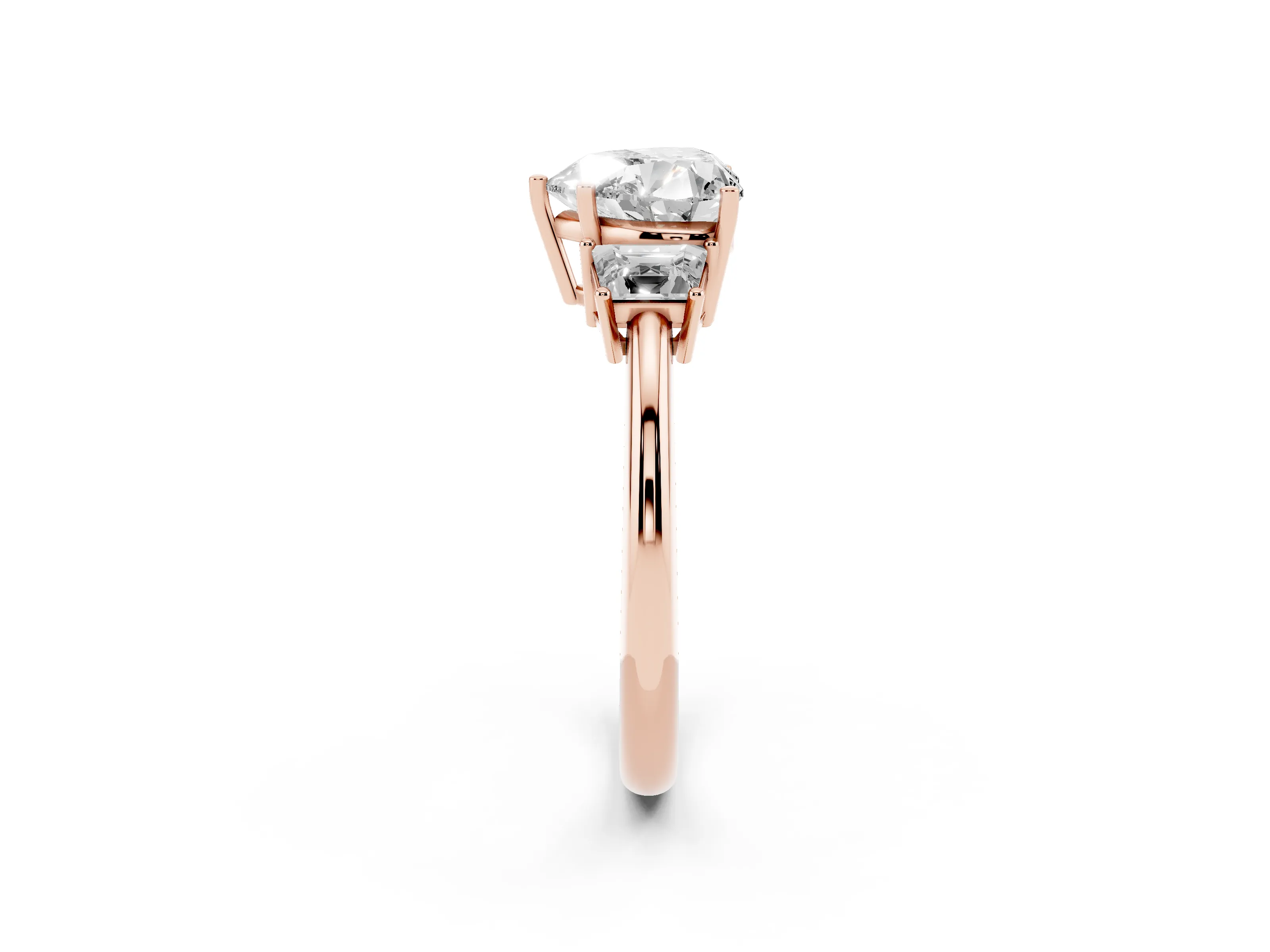 Heart Cut Diamond Three-Stone Ring Set in Rose gold with Trapezoid Side Stones and Prong Setting