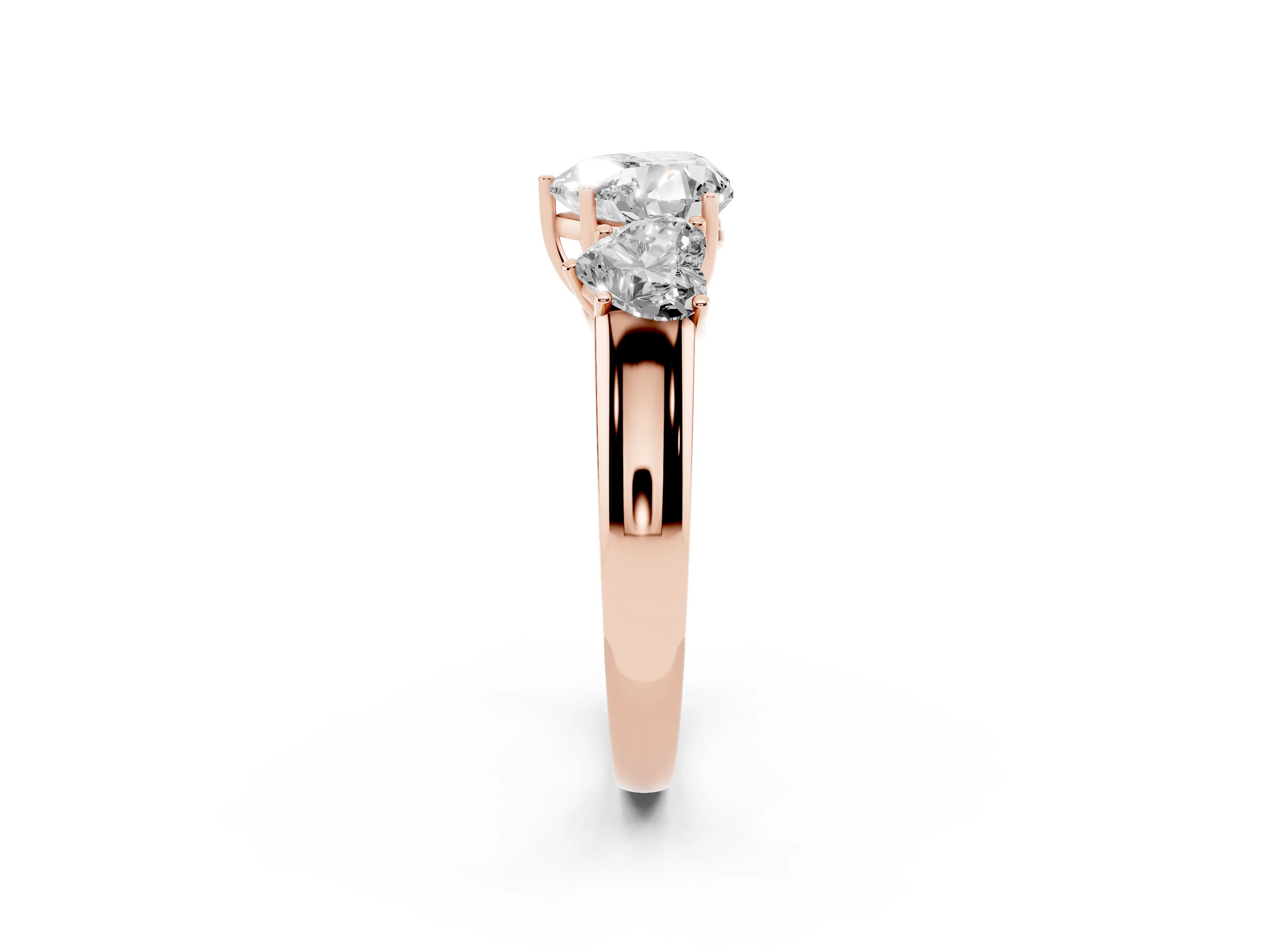 Three-Stone Heart Cut Diamond Ring Set in Rose gold with Matching Prong Settings and Plain Band