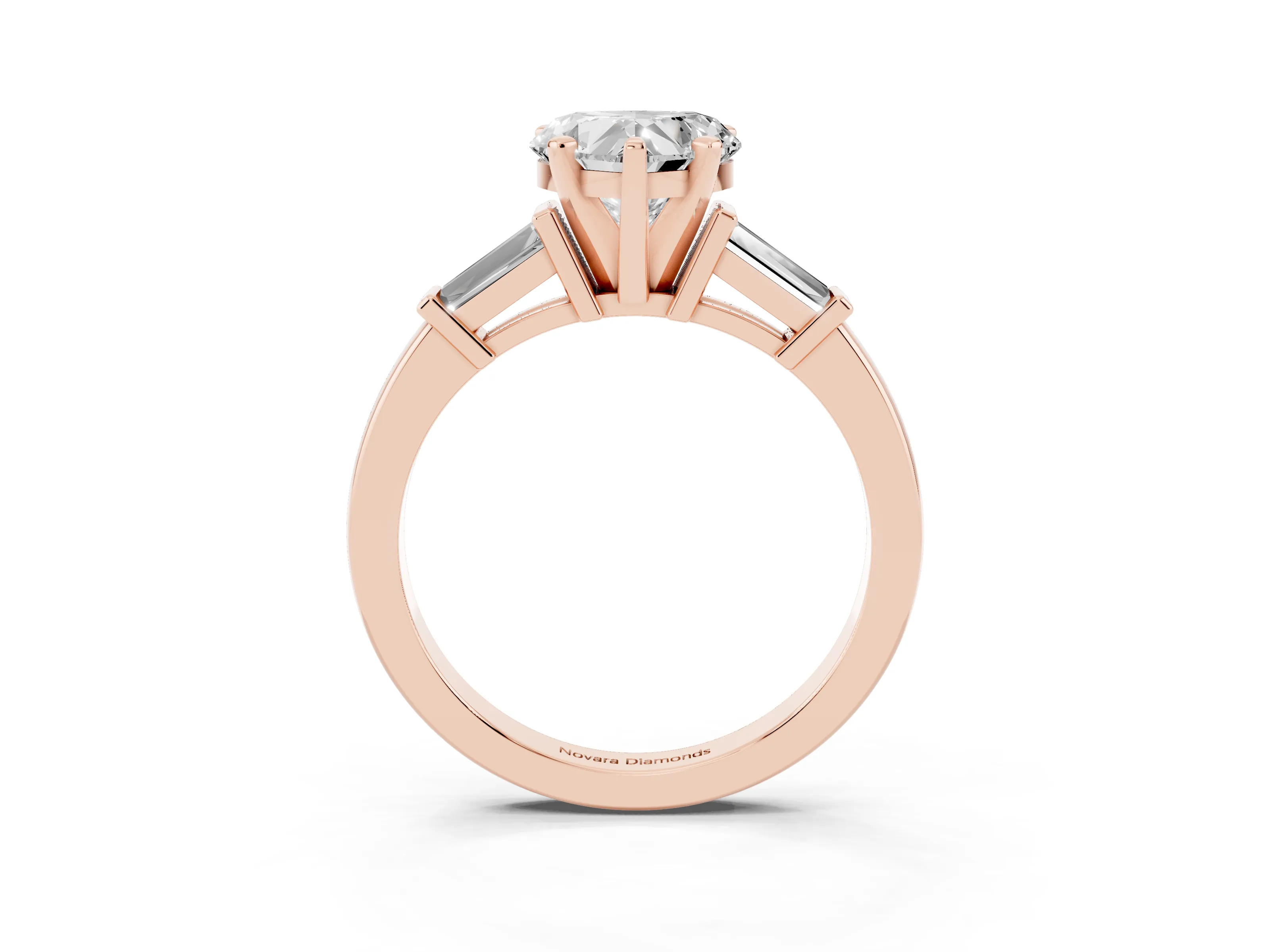 Heart Cut Diamond Solitaire Ring Set in Rose gold with Tapered Baguette Accents and Prong Setting