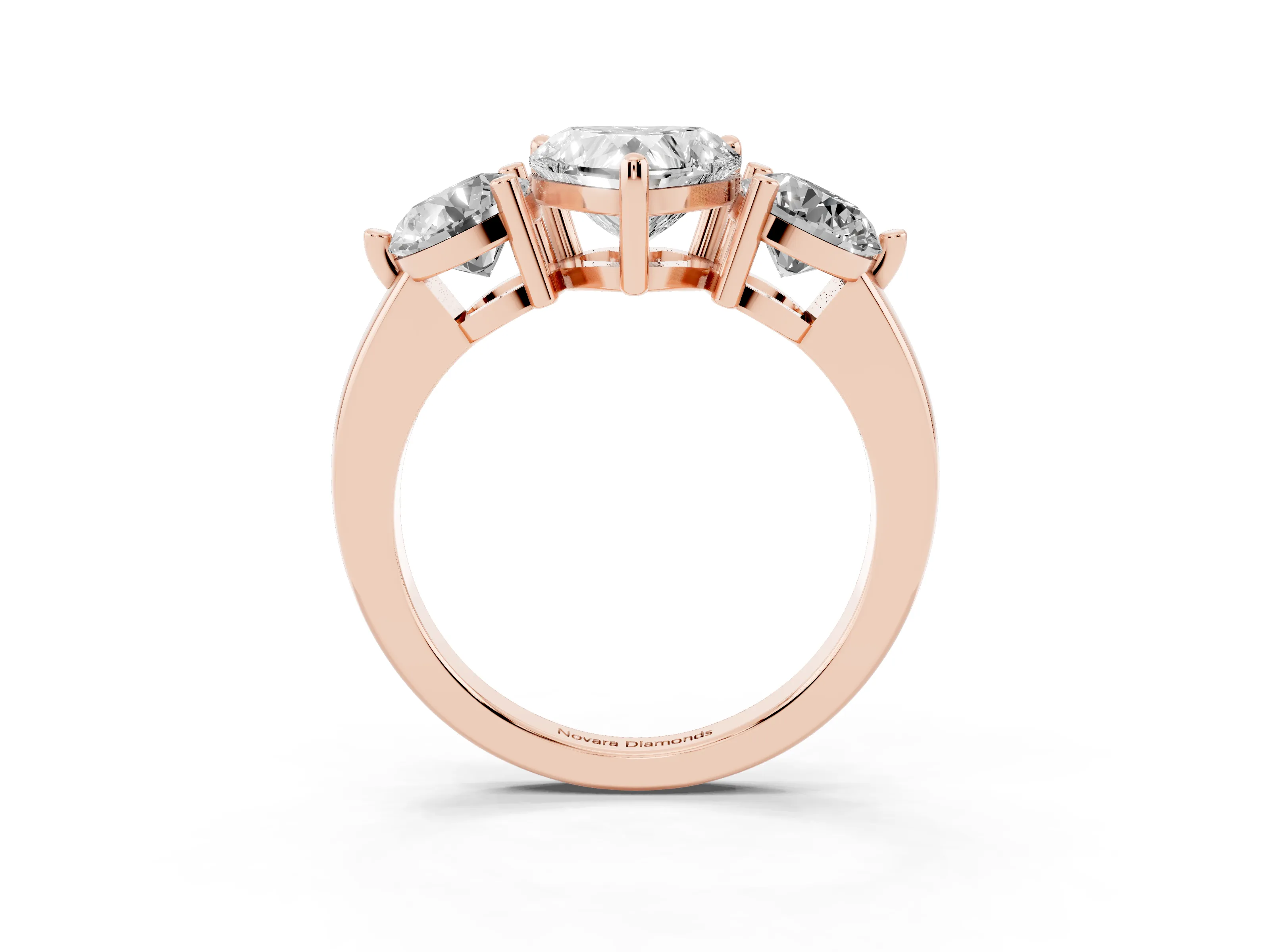 Heart Cut Diamond Three-Stone Ring Set in Rose gold with Prong Setting and Classic Band
