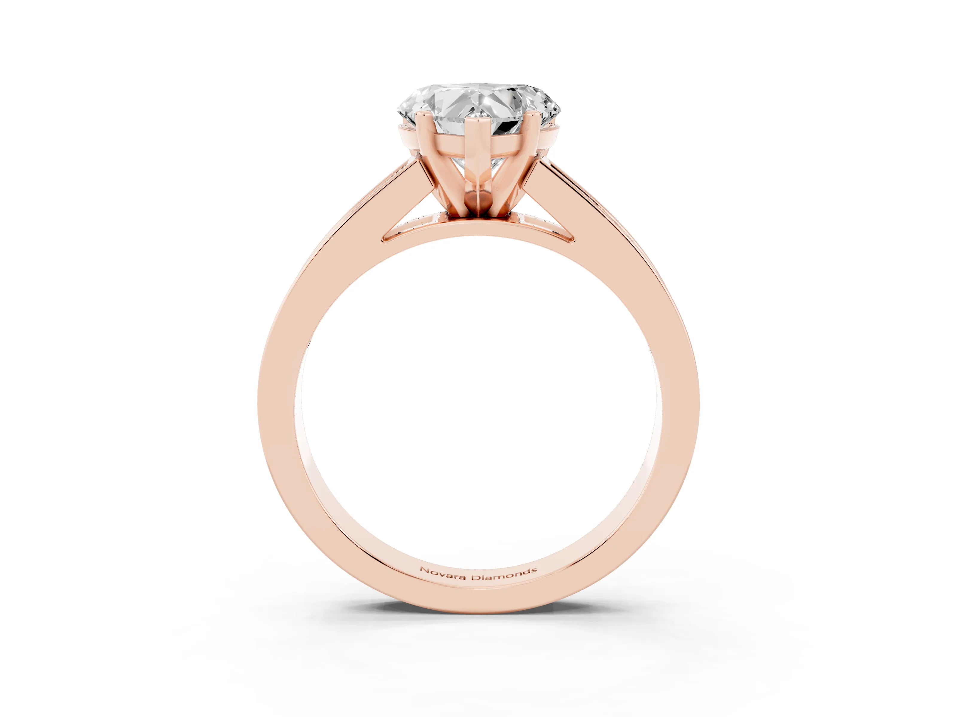 Heart Cut Diamond Solitaire Ring Set in Rose gold with Channel-Set Band and Prong Setting