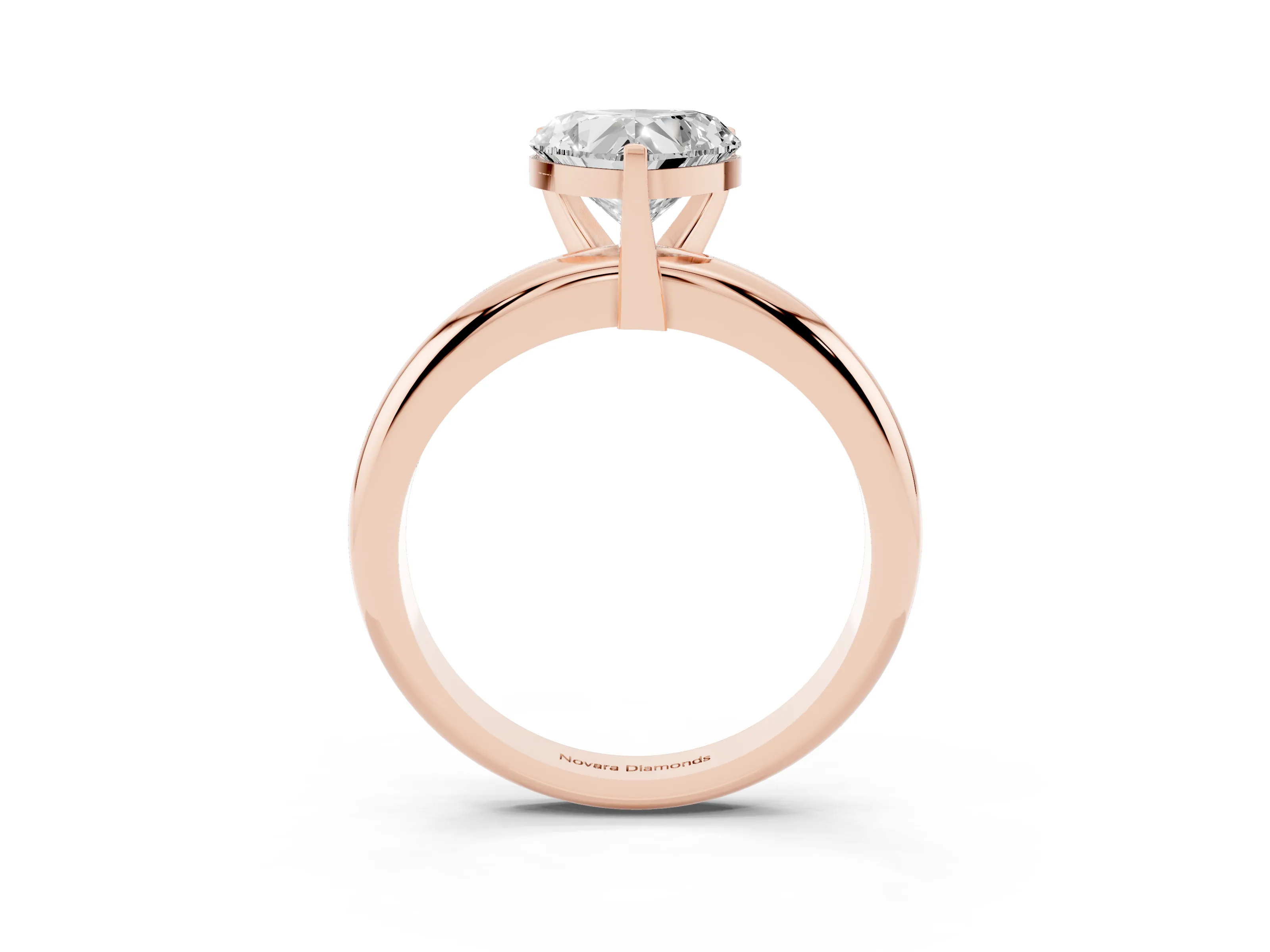 Heart Cut Diamond Solitaire Engagement Ring Set in Rose gold with Round Band and Prong Setting