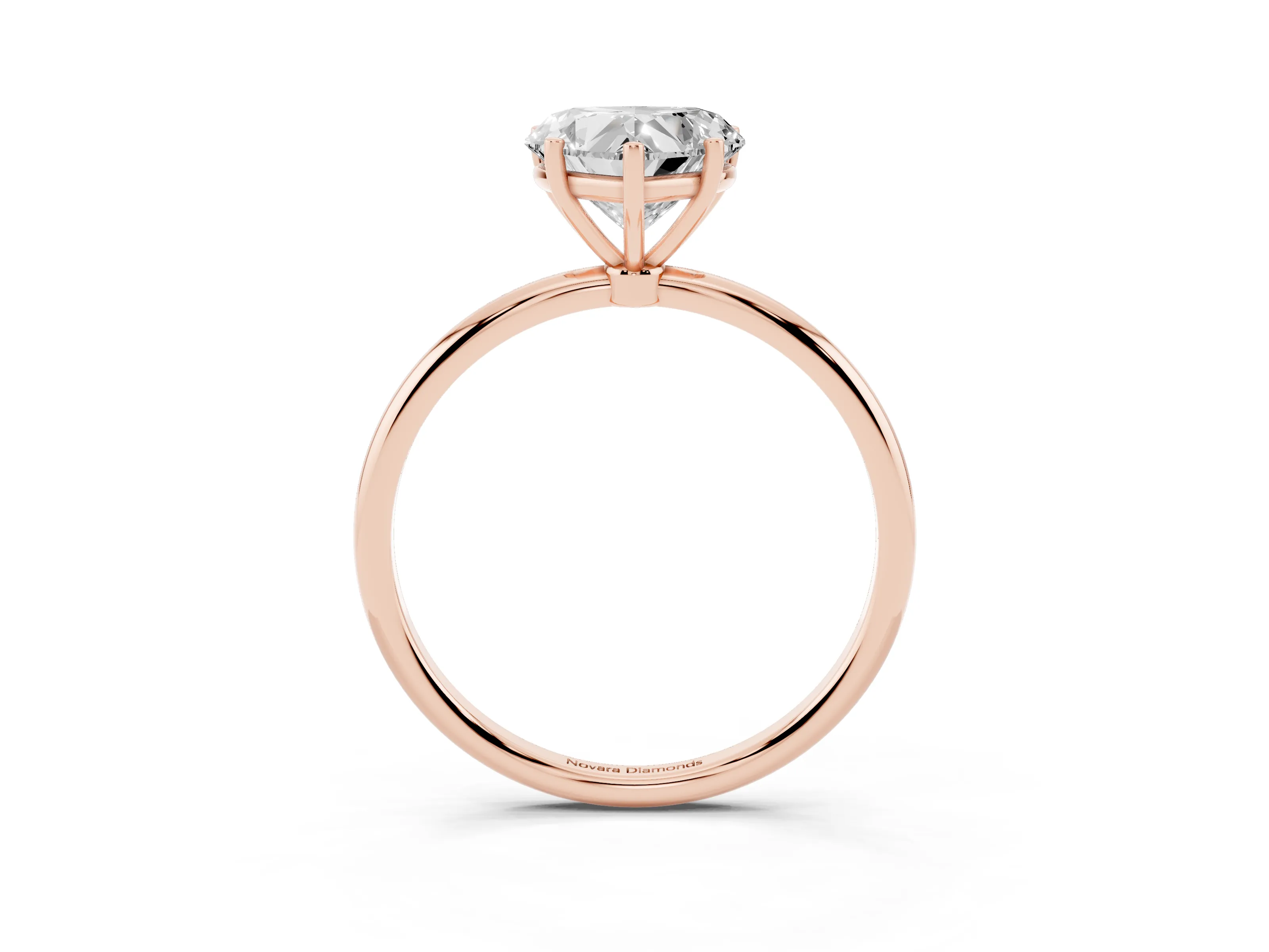 Heart Cut Diamond Solitaire Engagement Ring Set in Rose gold with Thin Band and Prong Setting