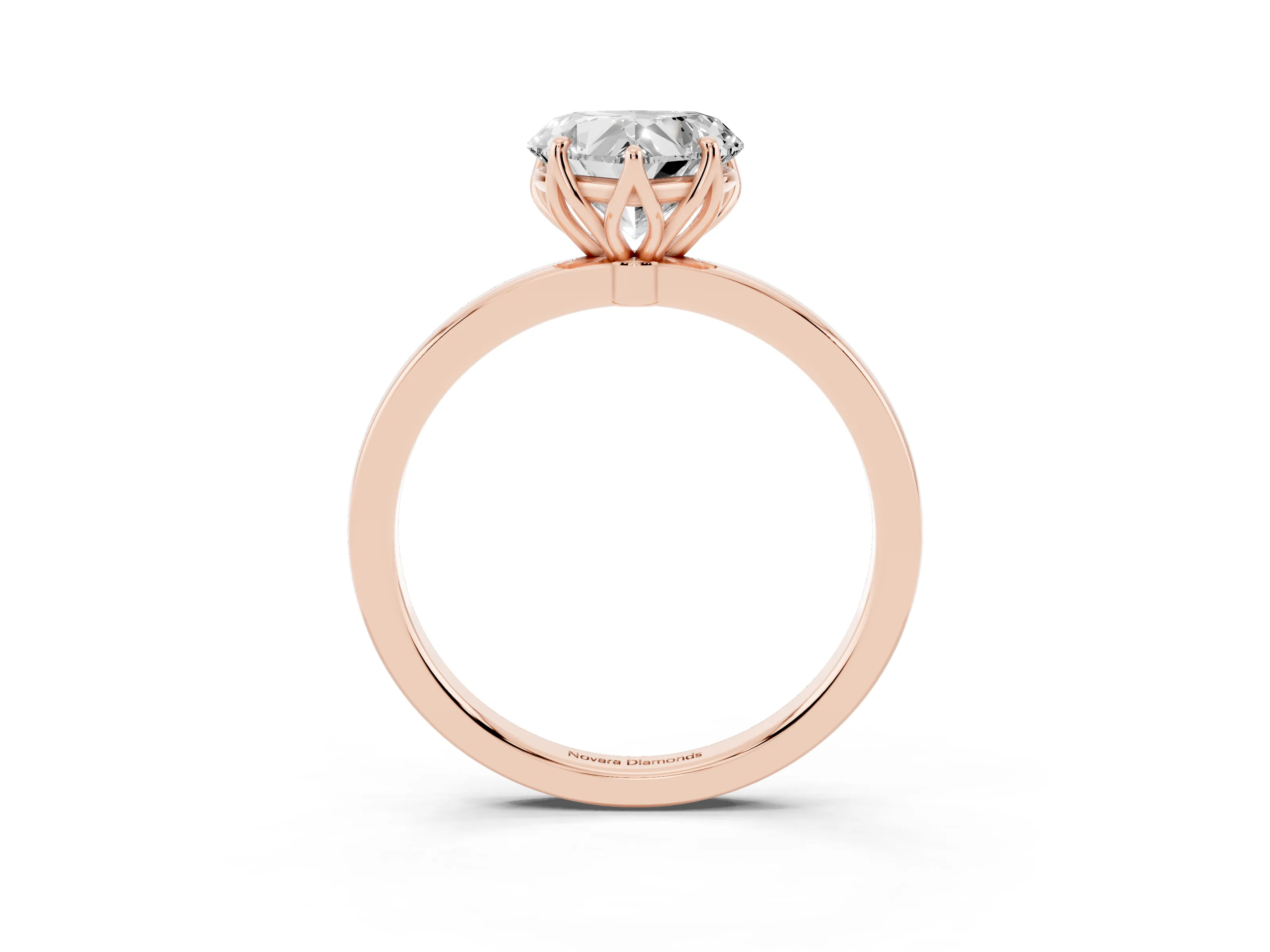 Heart Cut Diamond Solitaire Ring Set in Rose gold with Prong Setting and Thin Polished Band