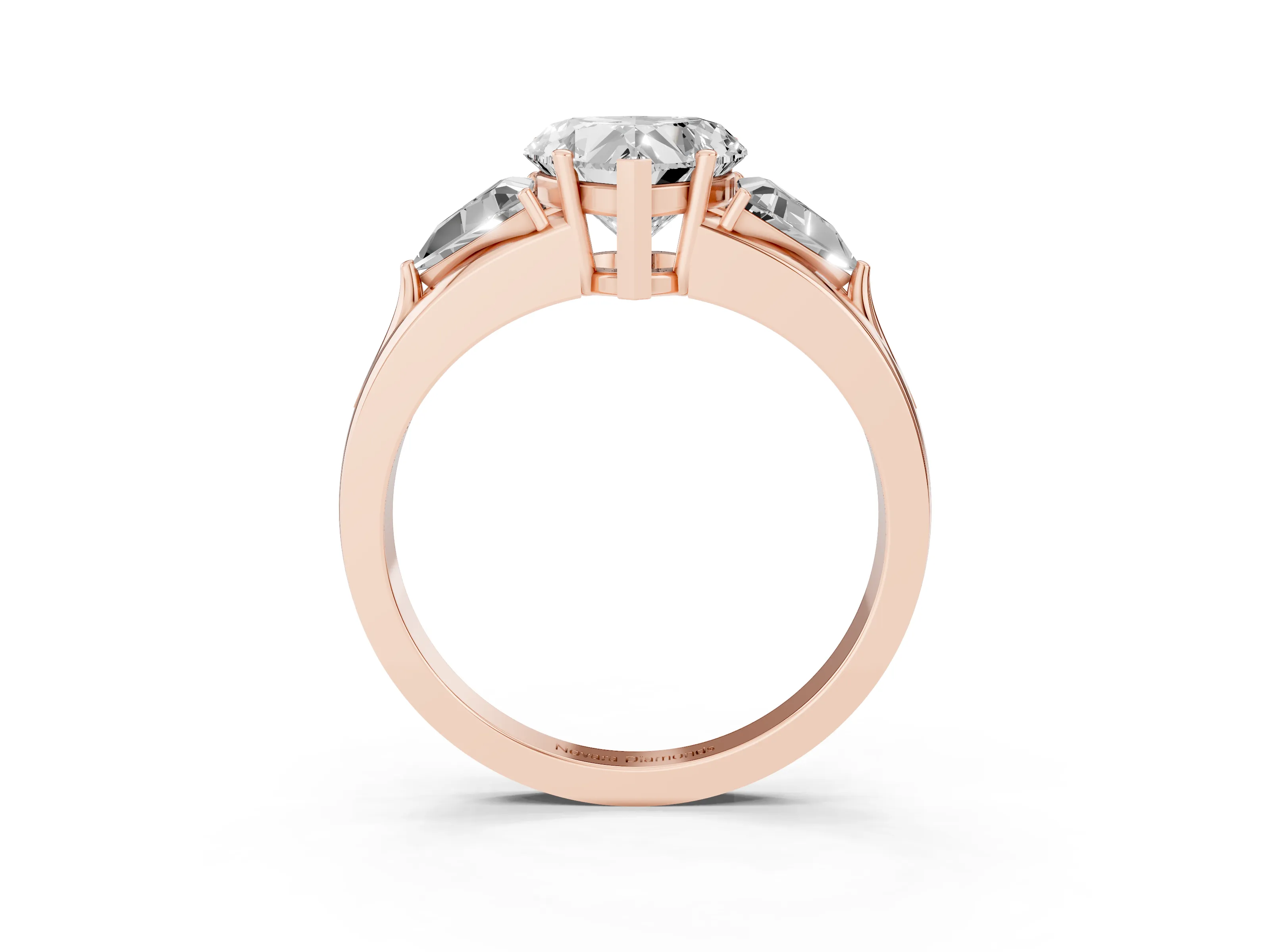 Heart Cut Diamond Three-Stone Ring Set in Rose gold with Trillion Side Stones and Split Shank