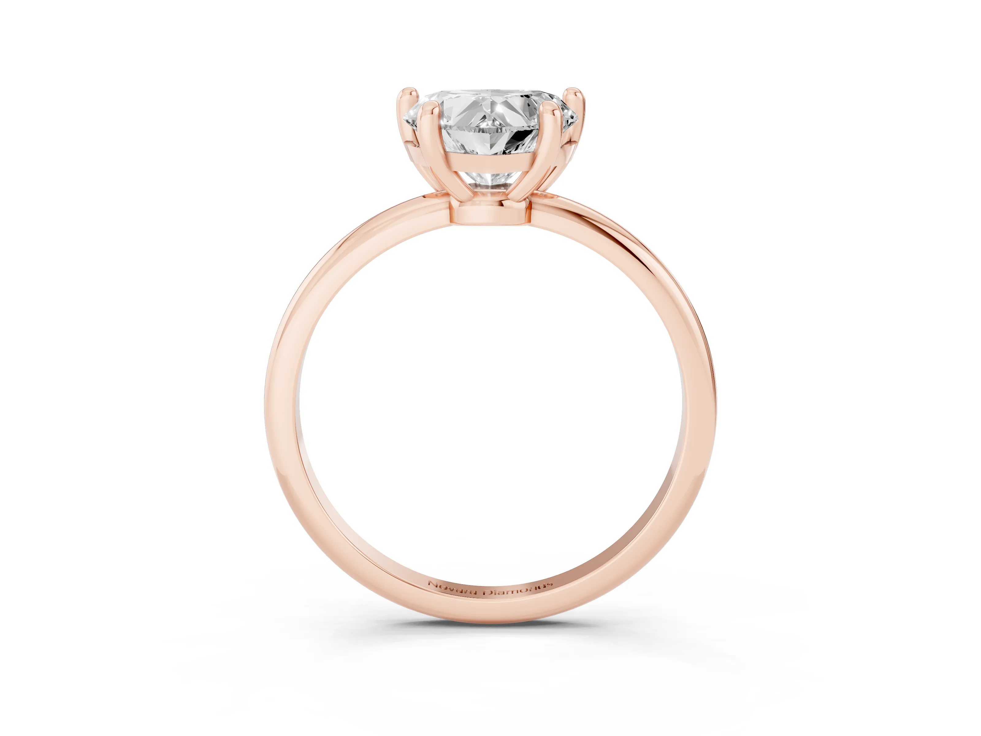 Heart Cut Diamond Solitaire Ring Set in Rose gold with Secure Prong Setting on a Classic Band