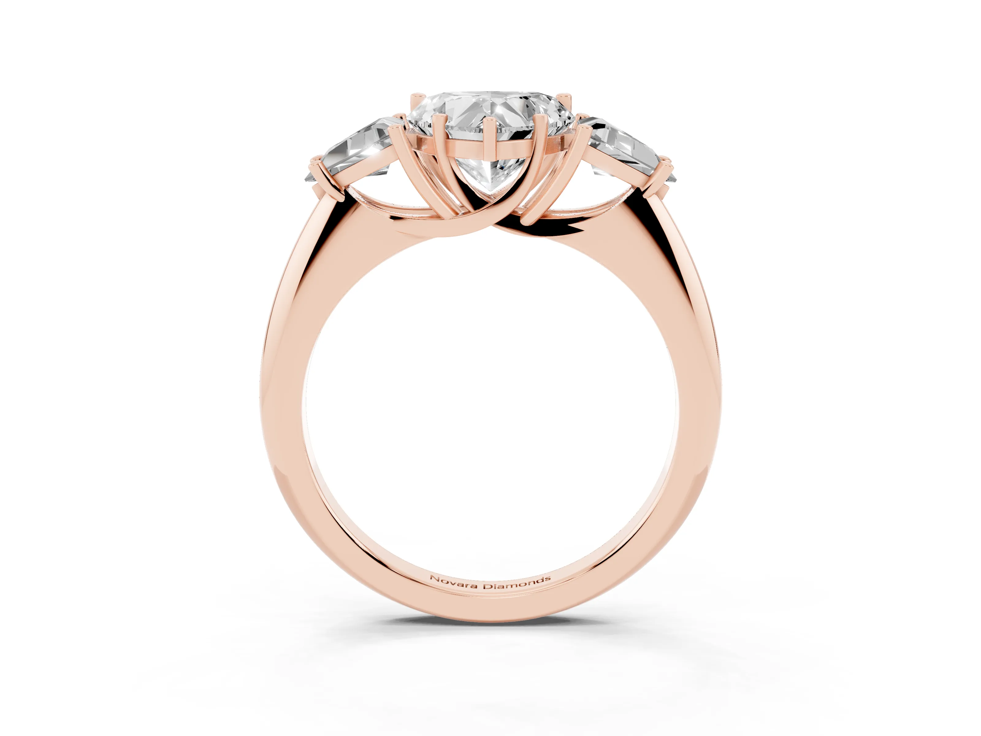 Heart Cut Diamond Three-Stone Engagement Ring Set in Rose gold with Trillion Side Stones