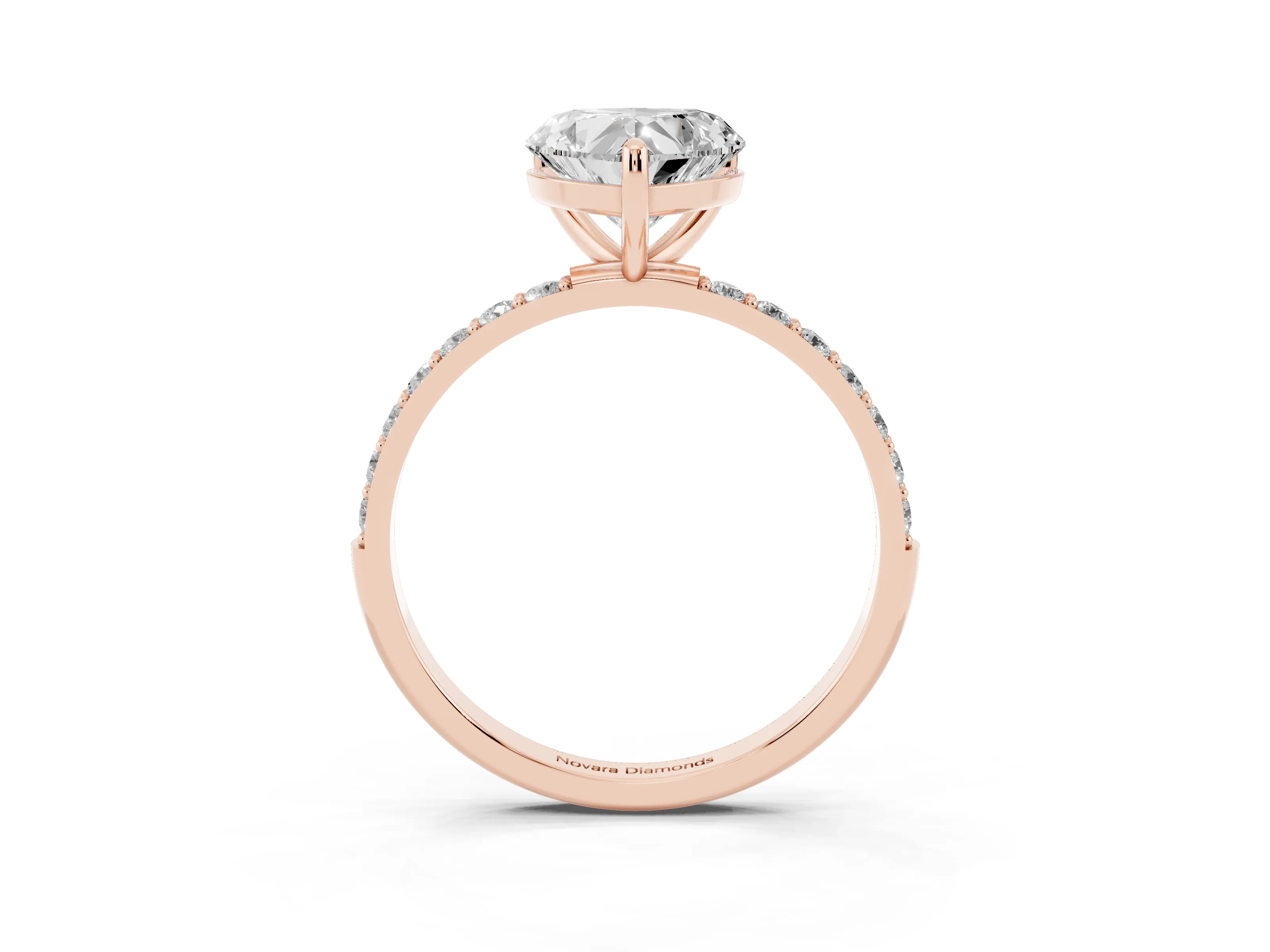 Heart Cut Diamond Solitaire Ring Set in Rose gold with Round Pavé Band and Prong Setting