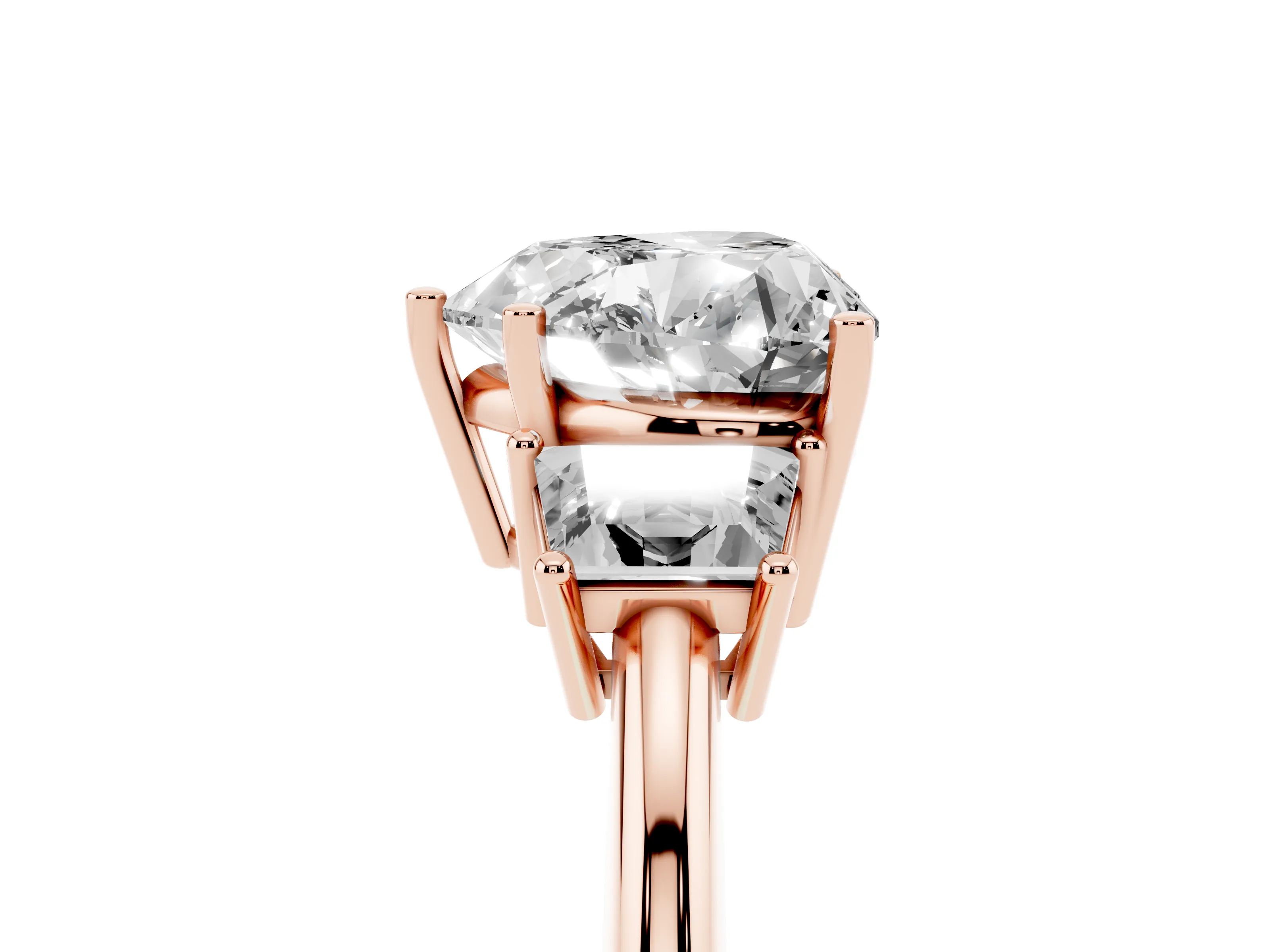 Heart Cut Diamond Three-Stone Ring Set in Rose gold with Trapezoid Side Stones and Prong Setting