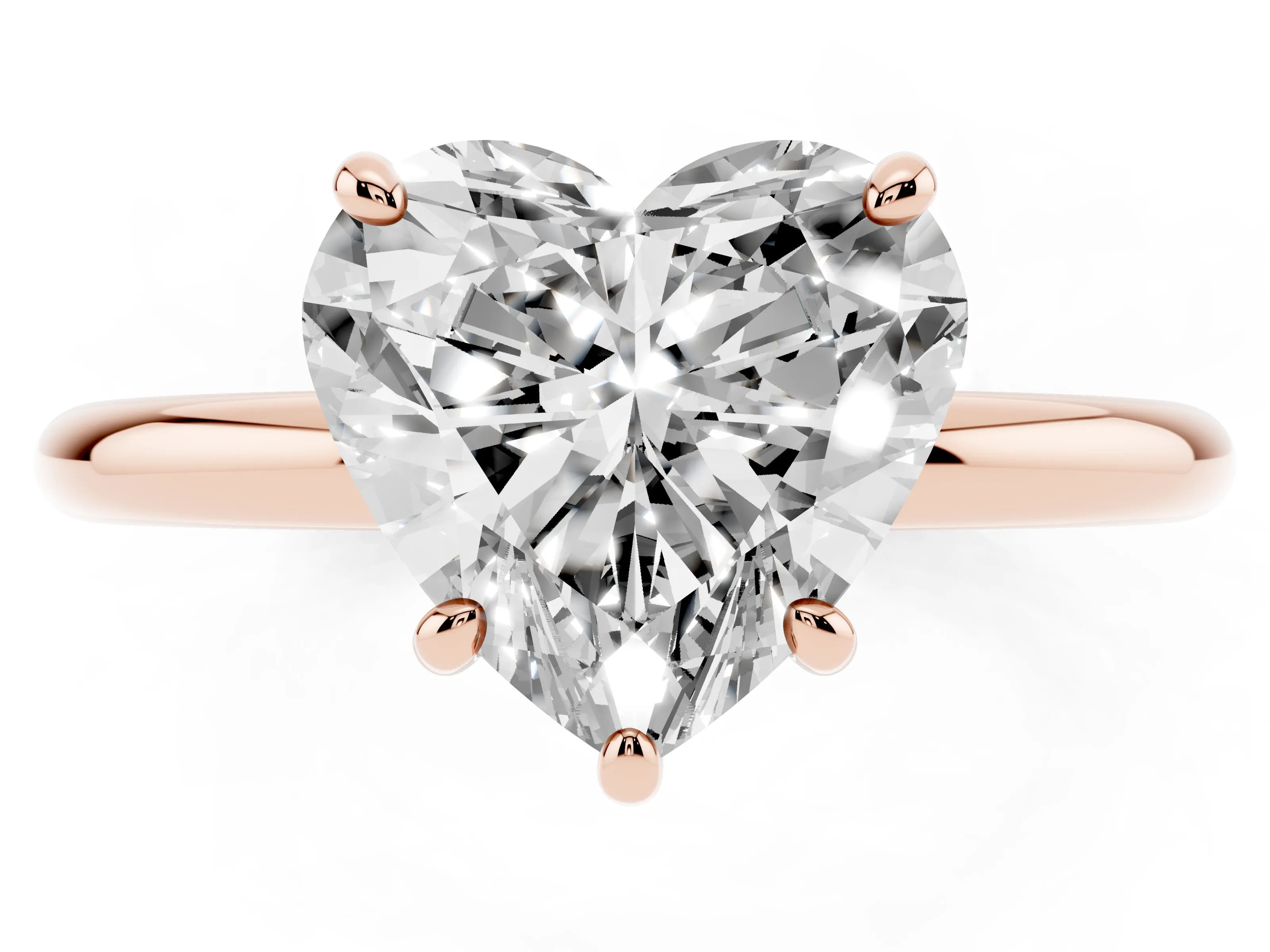 Heart Cut Diamond Solitaire Ring Set in Rose gold with Prong Setting on a Polished Plain Band