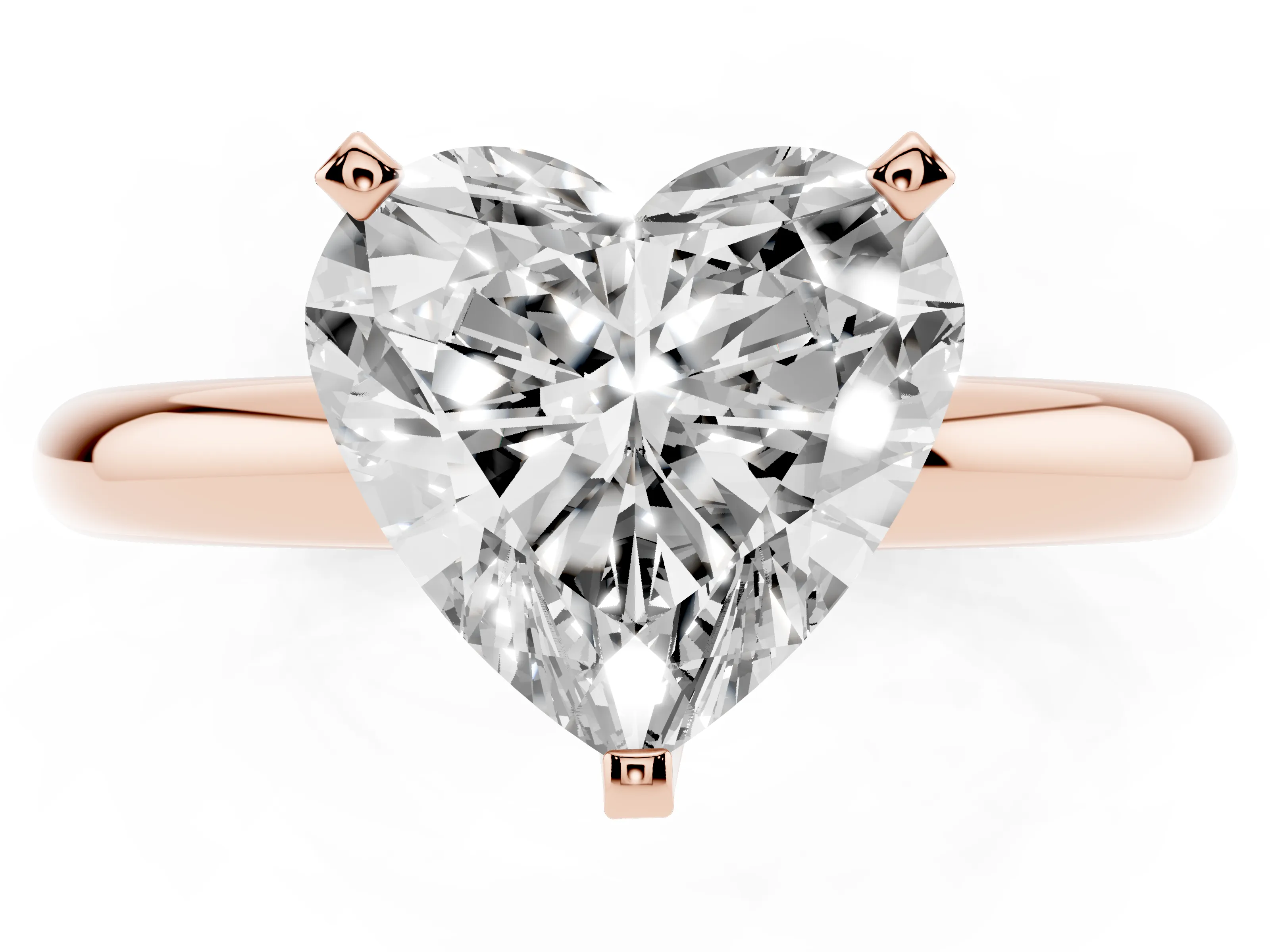 Heart Cut Diamond Solitaire Engagement Ring Set in Rose gold with Round Band and Prong Setting