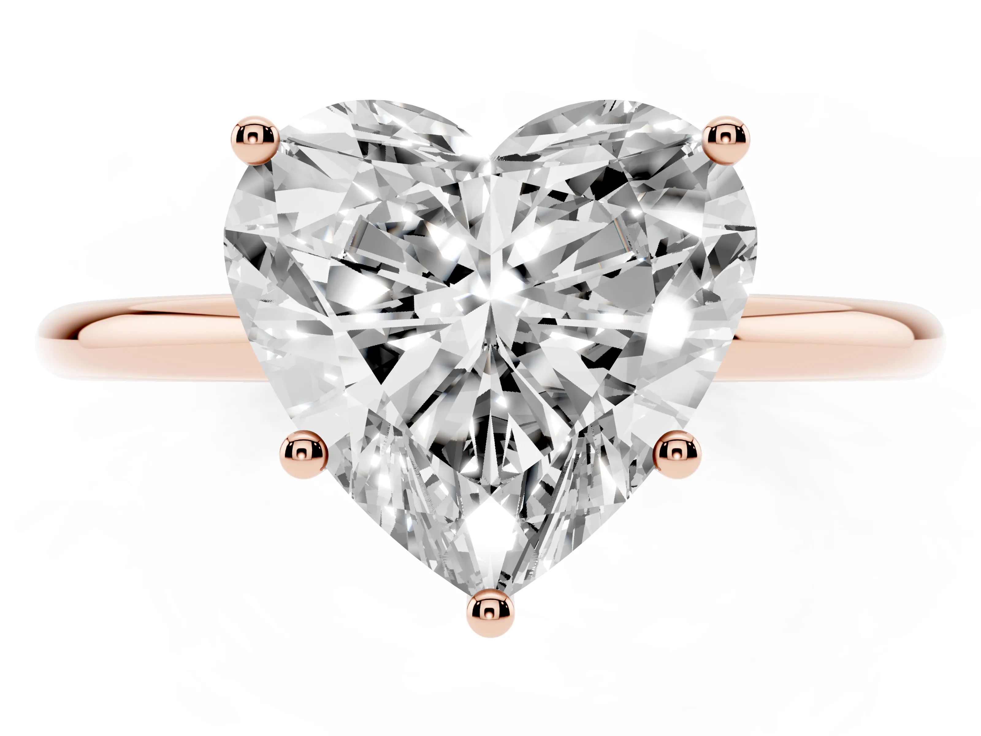 Heart Cut Diamond Solitaire Engagement Ring Set in Rose gold with Thin Band and Prong Setting