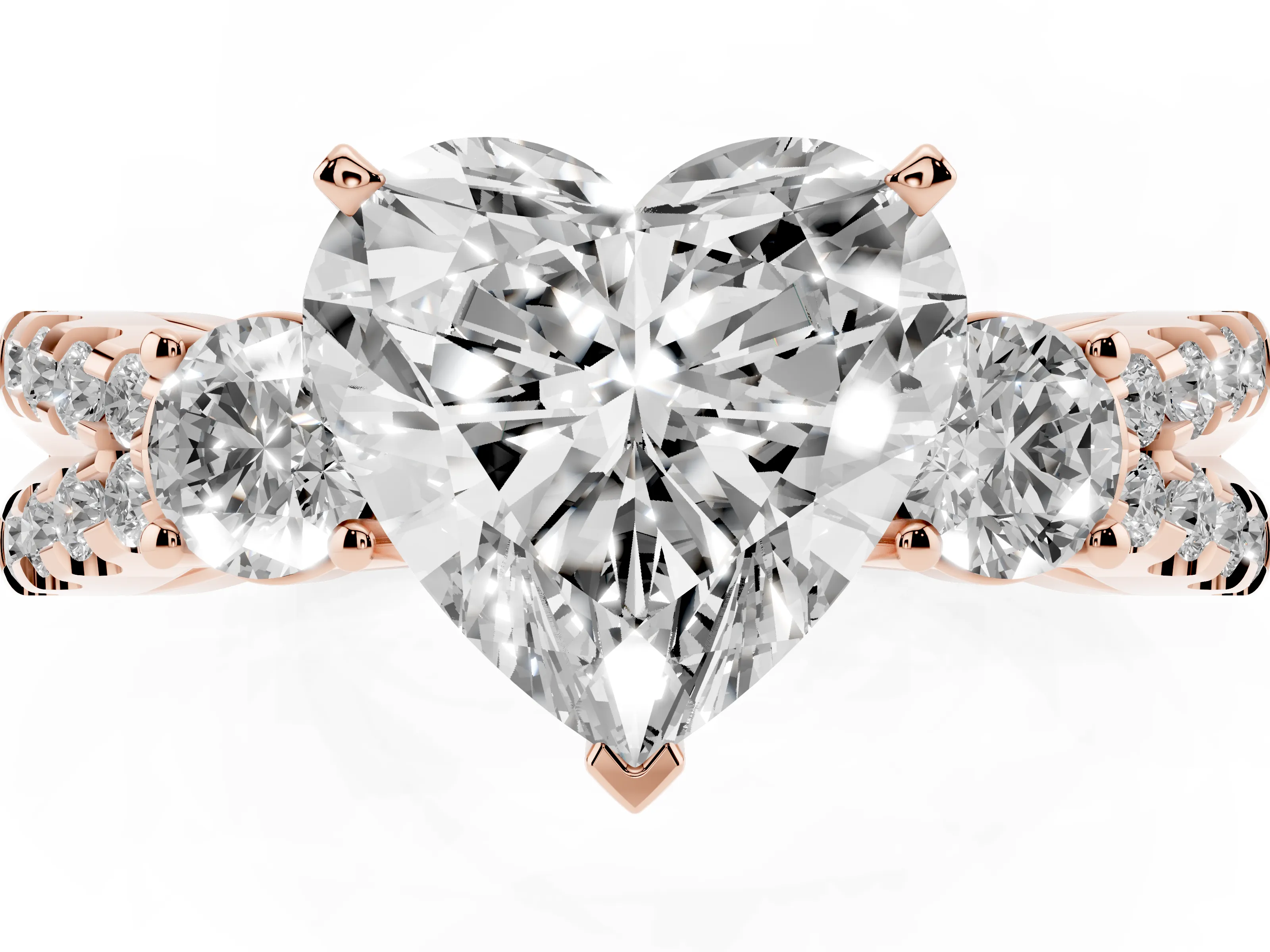 Heart Cut Diamond Three-Stone Ring Set in Rose gold with Pavé Split Shank and Prong Setting