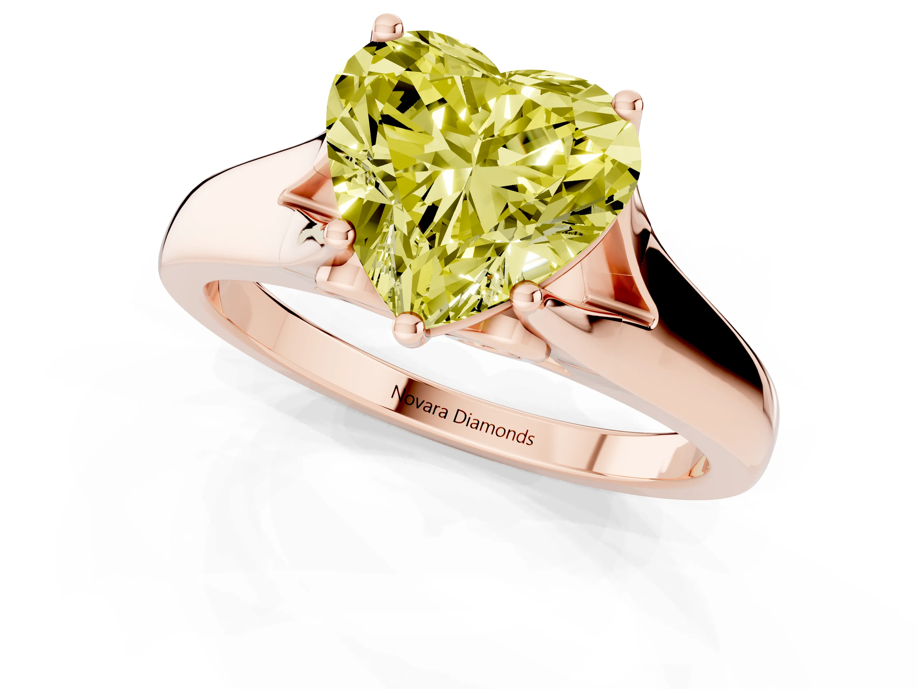Fancy Yellow Heart Cut Diamond Solitaire Ring Set in Rose gold with Arched Cathedral Band and Prong Setting