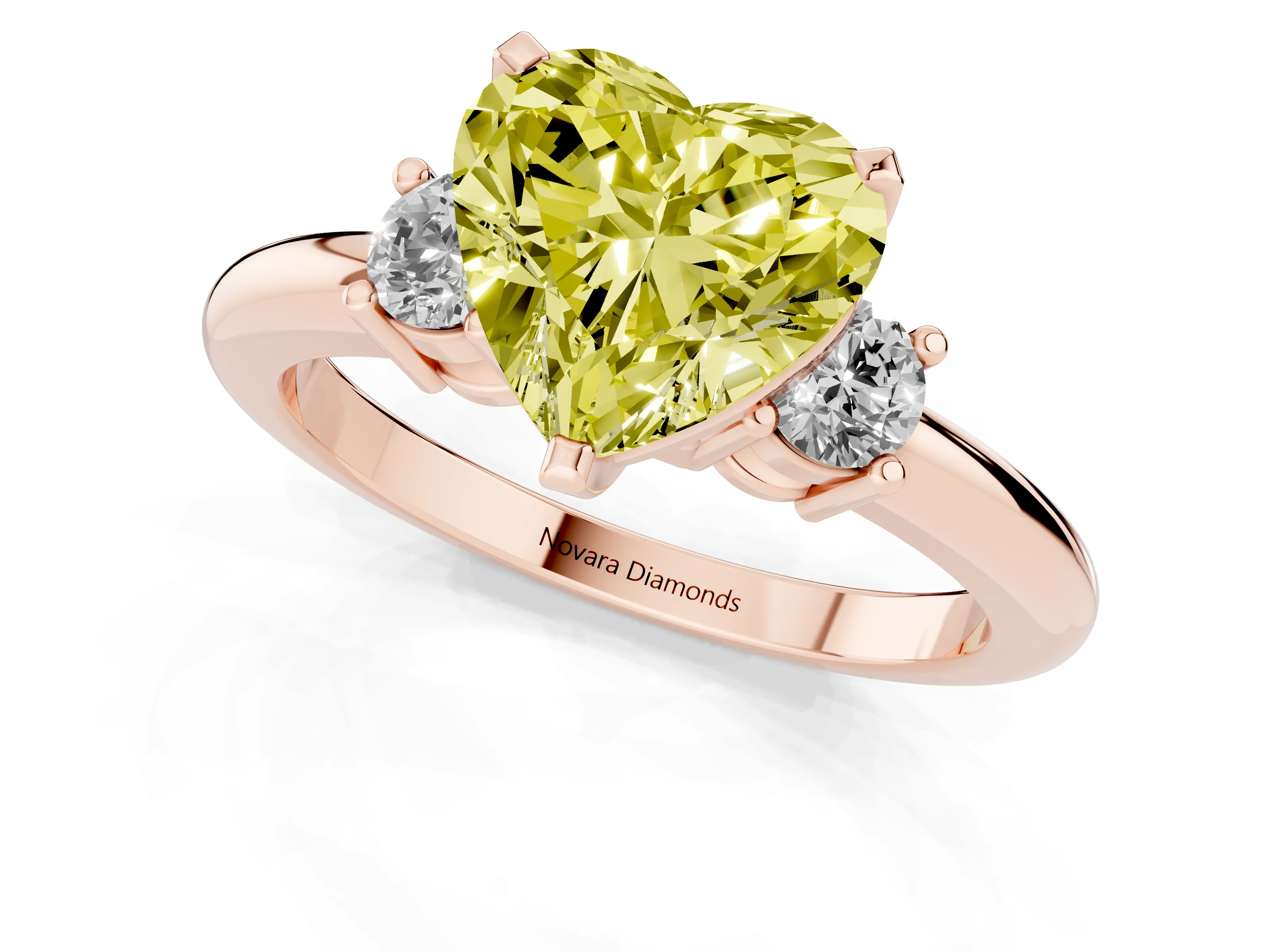 Fancy Yellow Three-Stone Heart Cut Diamond Ring Set in Rose gold with Prong Setting and Plain Band