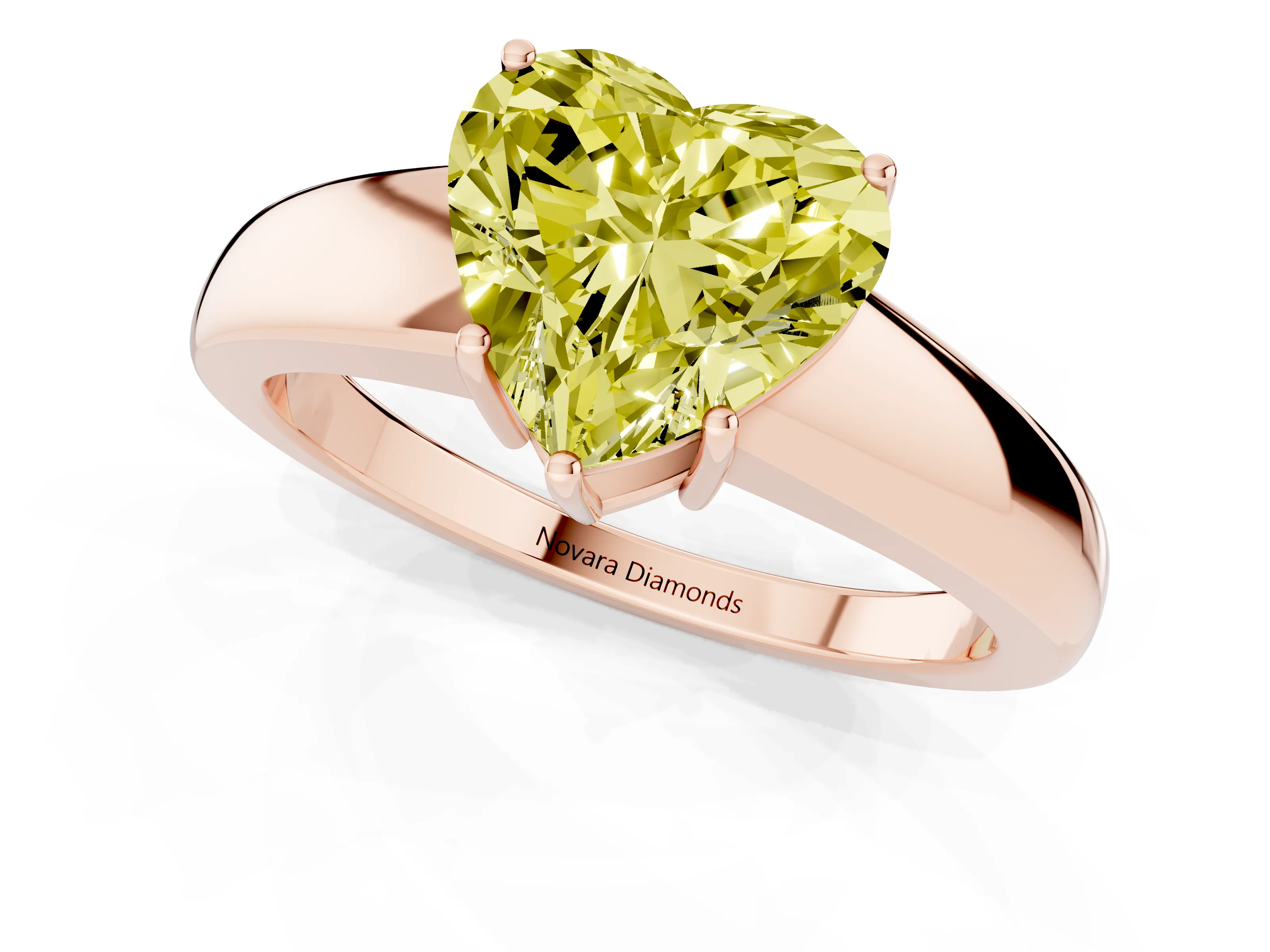 Fancy Yellow Heart Cut Diamond Solitaire Ring Set in Rose gold with Tapered Band and Prong Setting