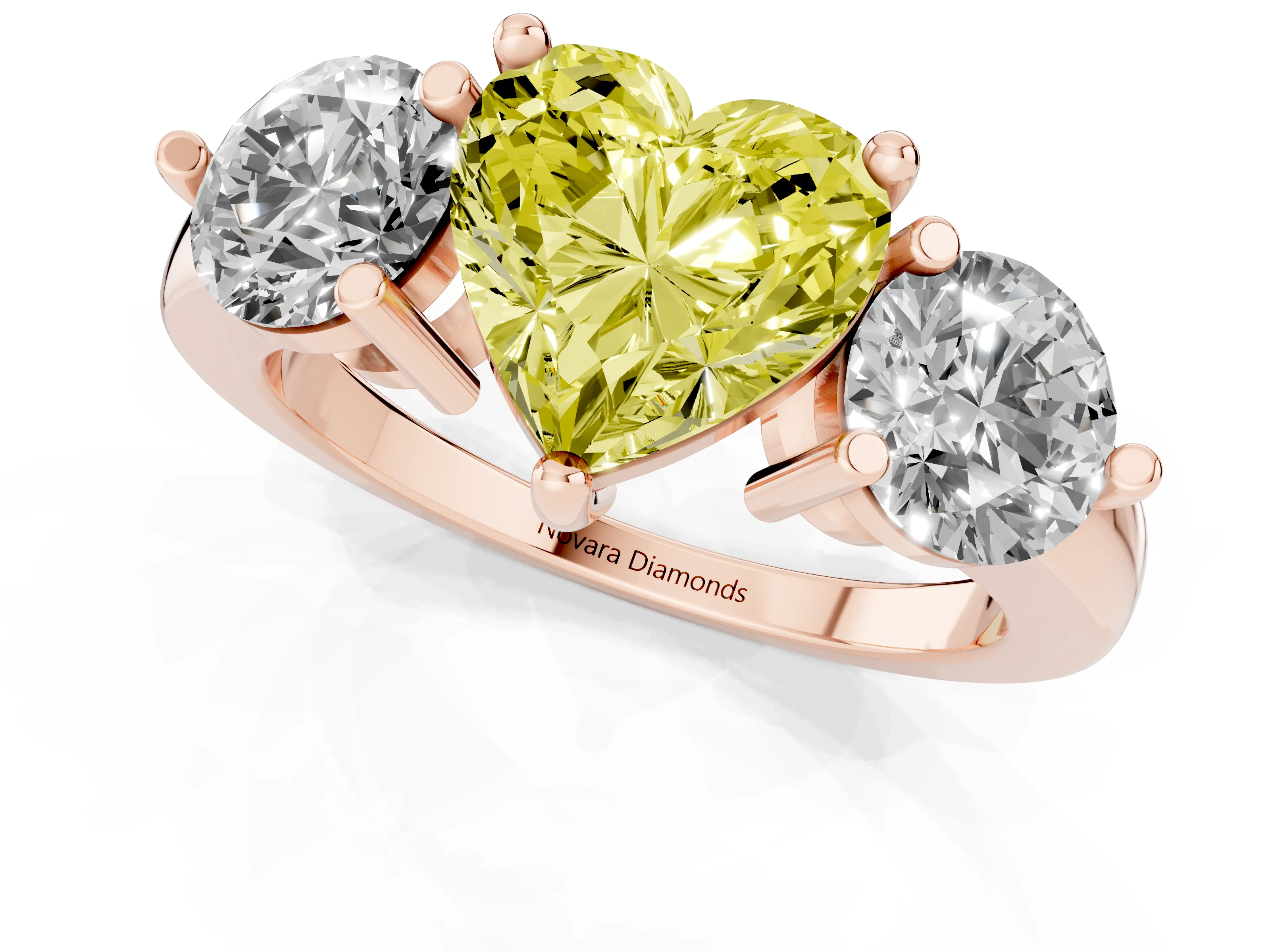 Fancy Yellow Heart Cut Diamond Three-Stone Ring Set in Rose gold with Prong Setting and Classic Band