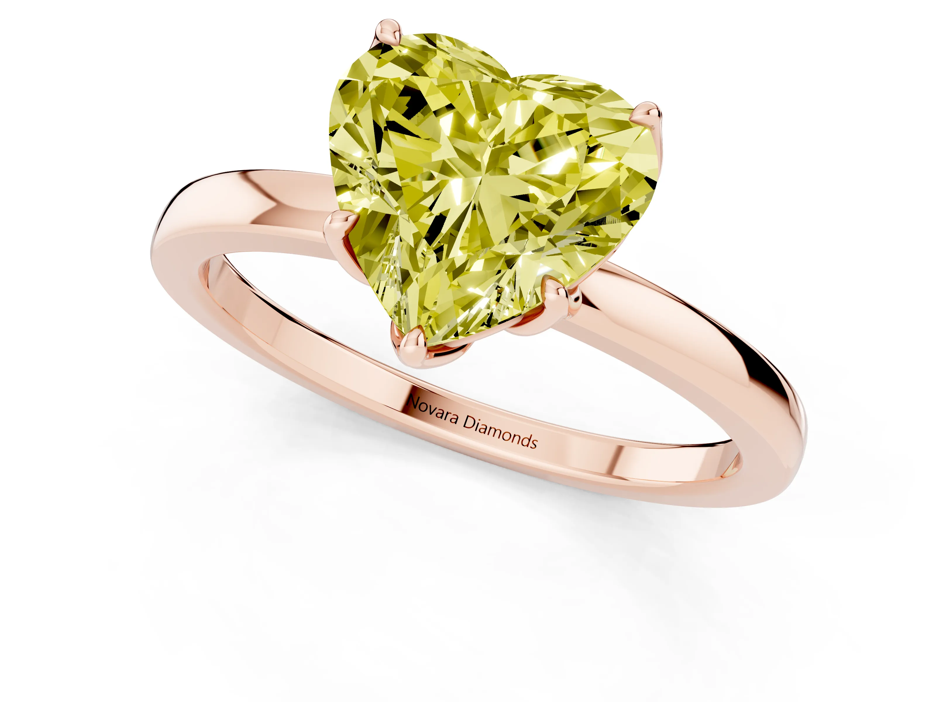 Fancy Yellow Heart Cut Diamond Solitaire Ring Set in Rose gold with Prong Setting and Thin Polished Band