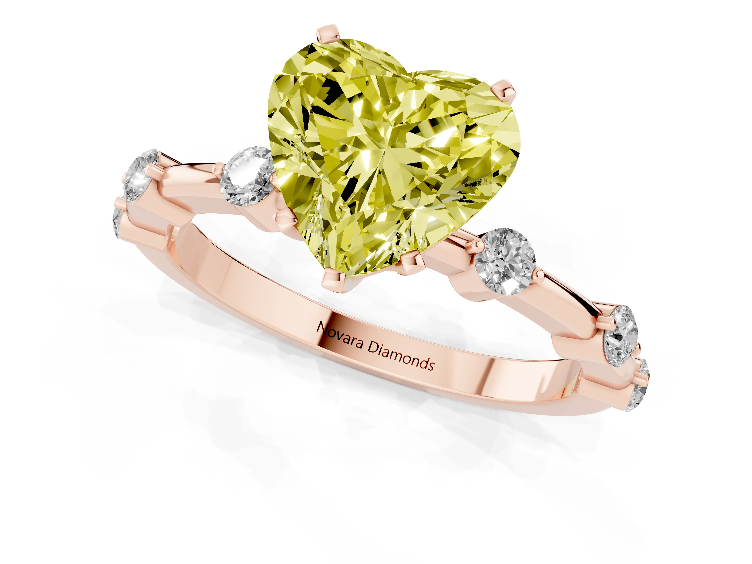Fancy Yellow Heart Cut Diamond Solitaire Ring Set in Rose gold with Bezel Set Side Stones and Prong Setting
