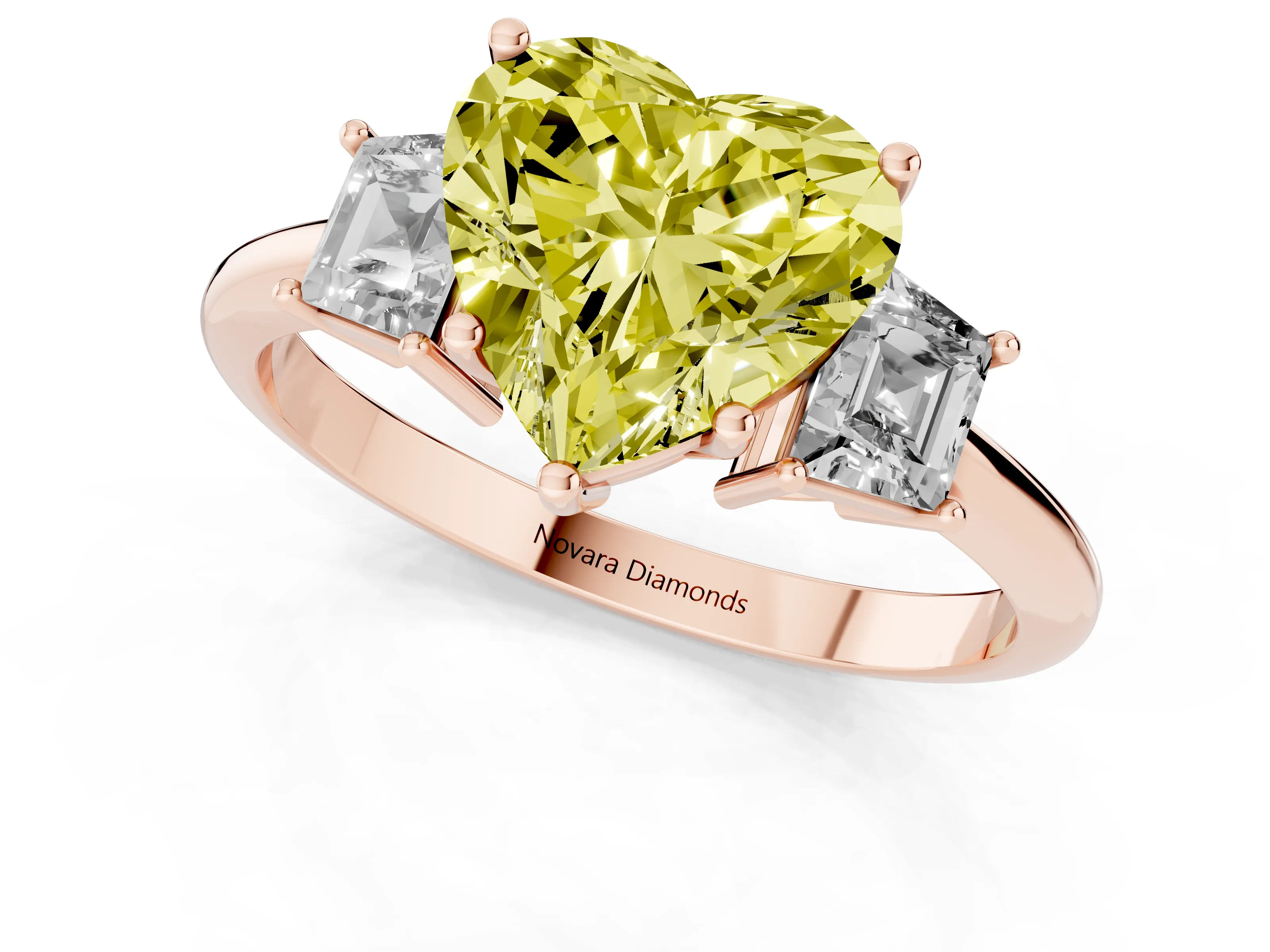 Fancy Yellow Heart Cut Diamond Three-Stone Ring Set in Rose gold with Trapezoid Side Stones and Prong Setting